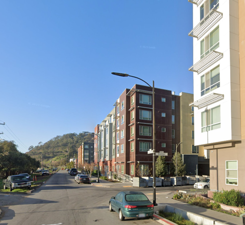 Street view of Phase 1. Architecture by others.