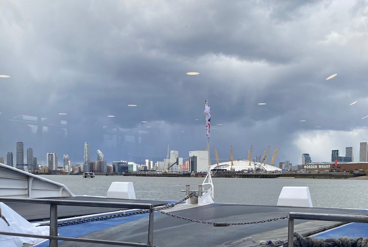 The O2 Millennium Dome seen from a Thames Clipper ferry heading east.