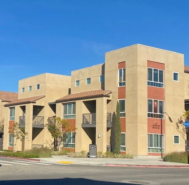 Stacked walk-up flats.