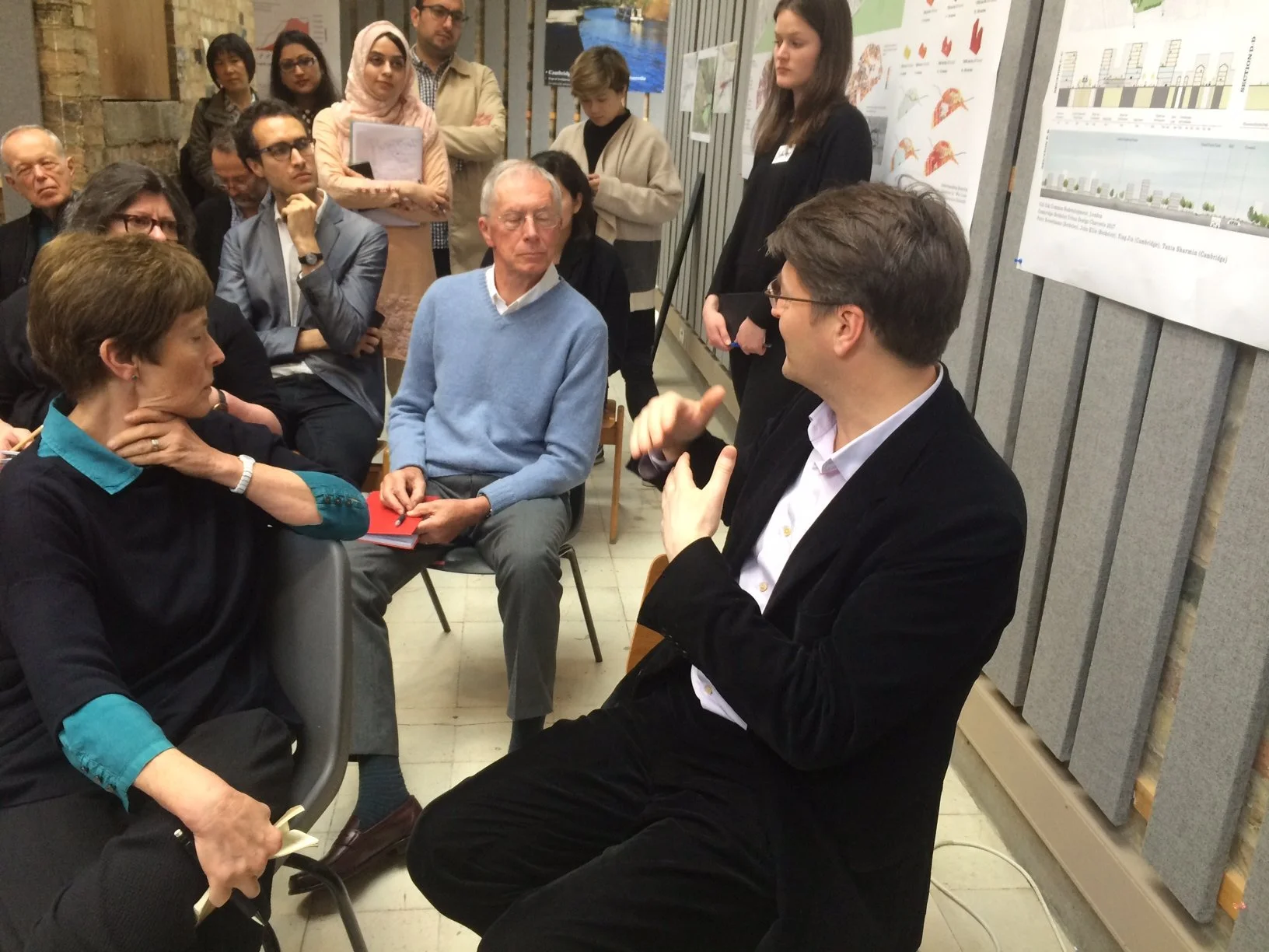 Jonathan Rose with Jo van Heyningen and John Sergeant discussing the merits of the designs.