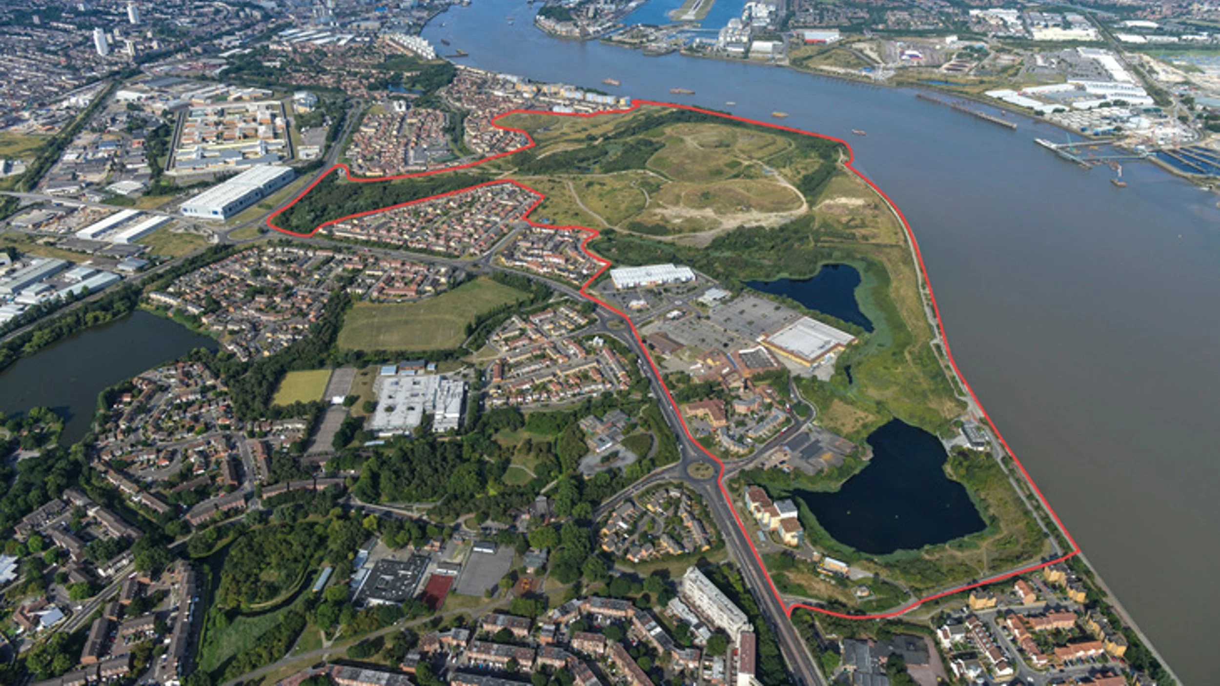 Aerial view of the site looking west towards London.