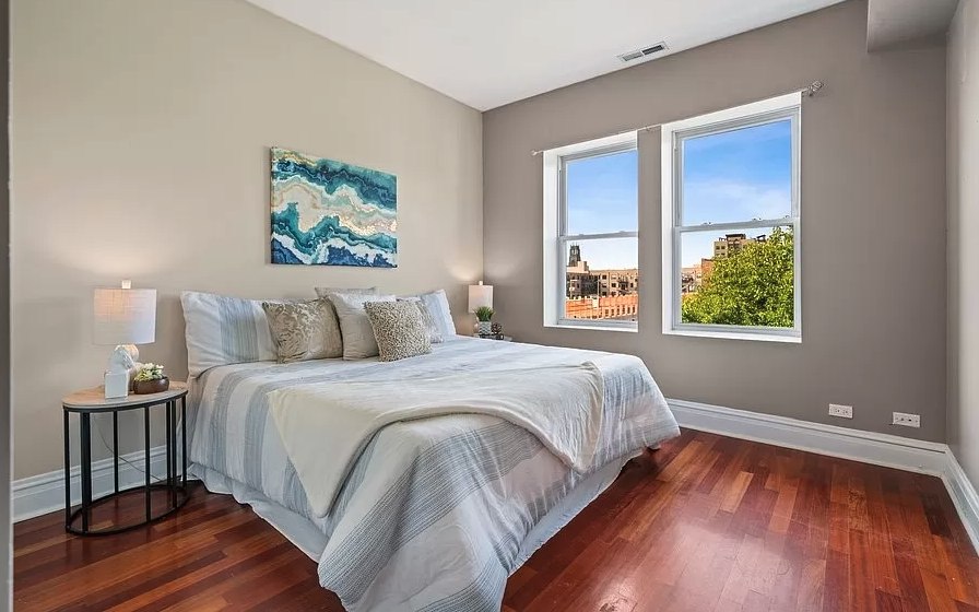 This bedroom was previously painted a dark purple.