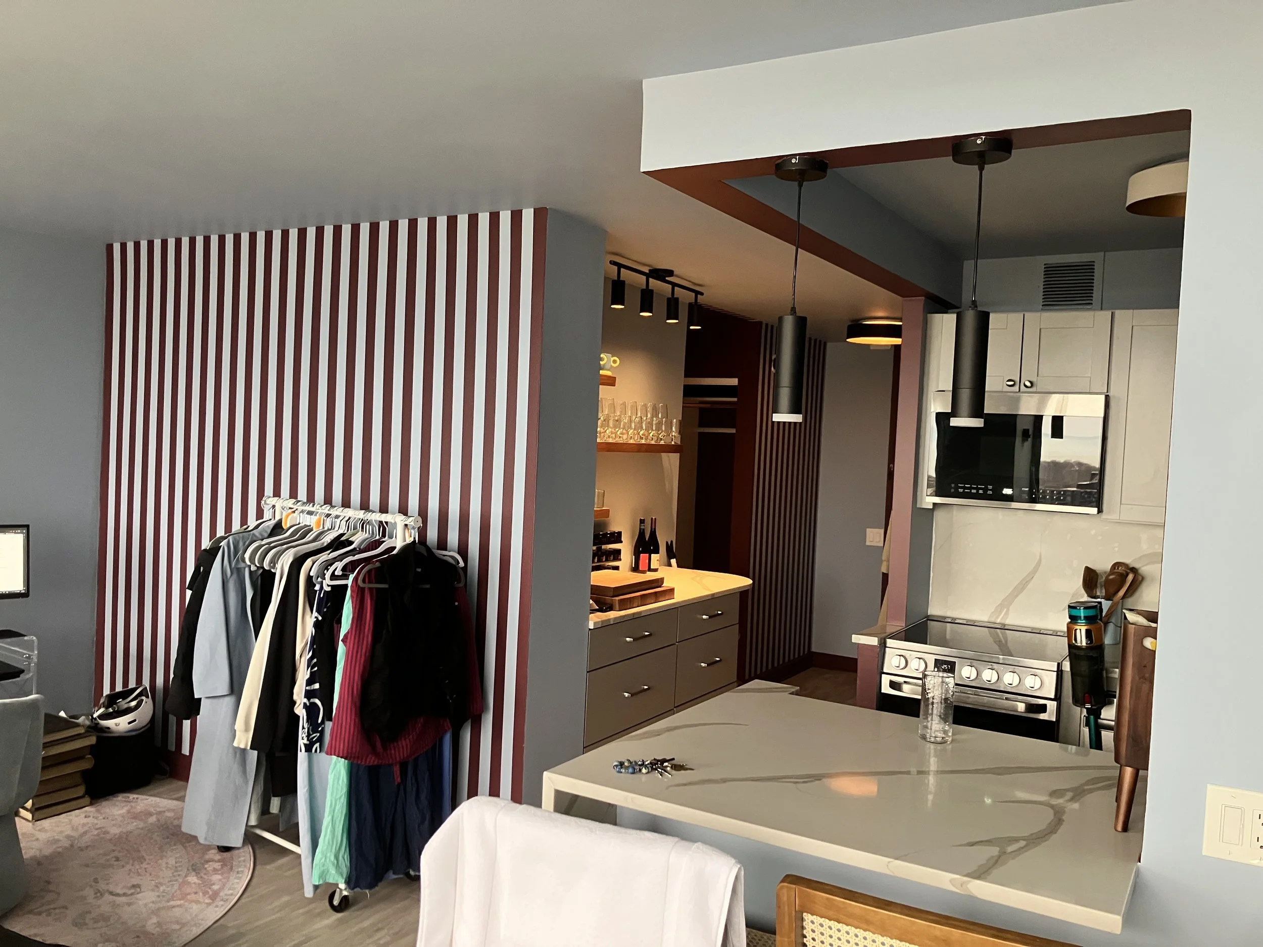 Loved the "lipstick" on the kitchen in this bold studio