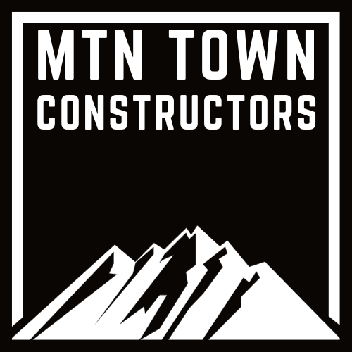 Logo for MTN Town Constructors featuring mountain illustration in black and white.
