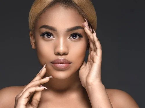 Woman with healthy, radiant skin and a natural glow