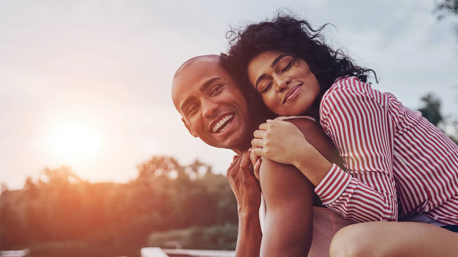 Happy couple embracing, representing fertility and cycle health care in Brandon, FL