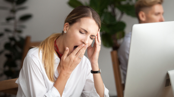 Person yawning from poor sleep, insomnia, and daytime fatigue