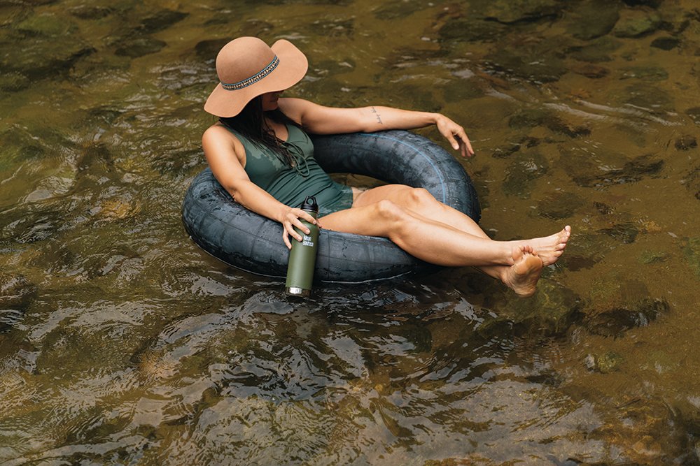K20VCPPL-FP-Girl+with+Hat+Floating+in+RiverTube.jpeg