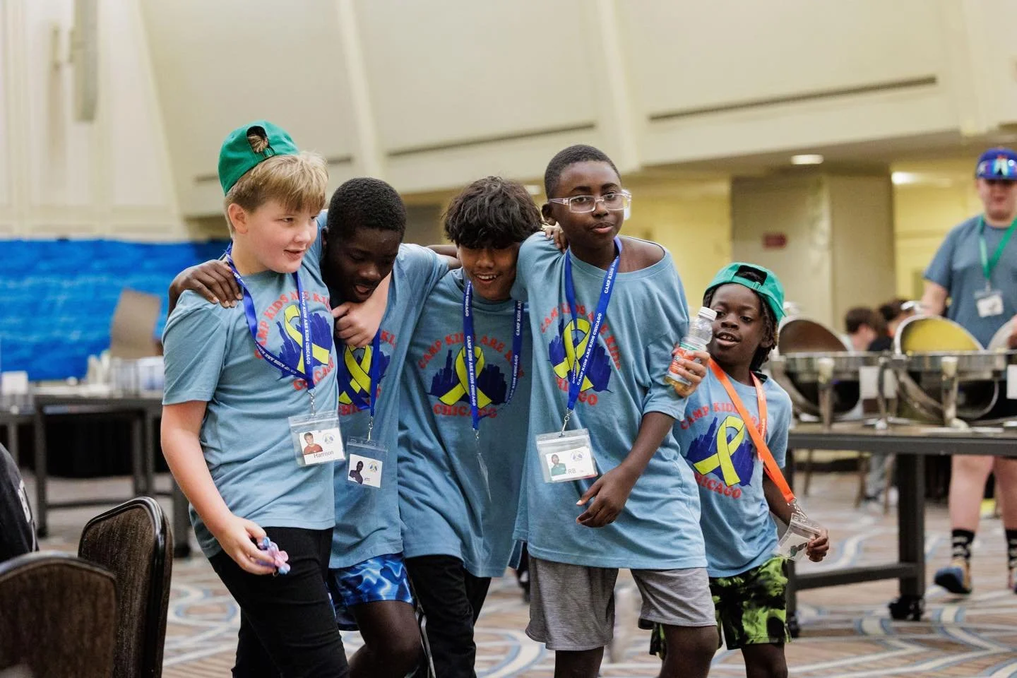 📸💛 Vote for Camp Kids Are Kids Chicago! 💛📸
We&rsquo;re excited to share one of our favorite camp photos in the Best of COCA Member&rsquo;s Choice Awards! This snapshot captures pure joy &mdash; campers walking together, laughing, and showing the 