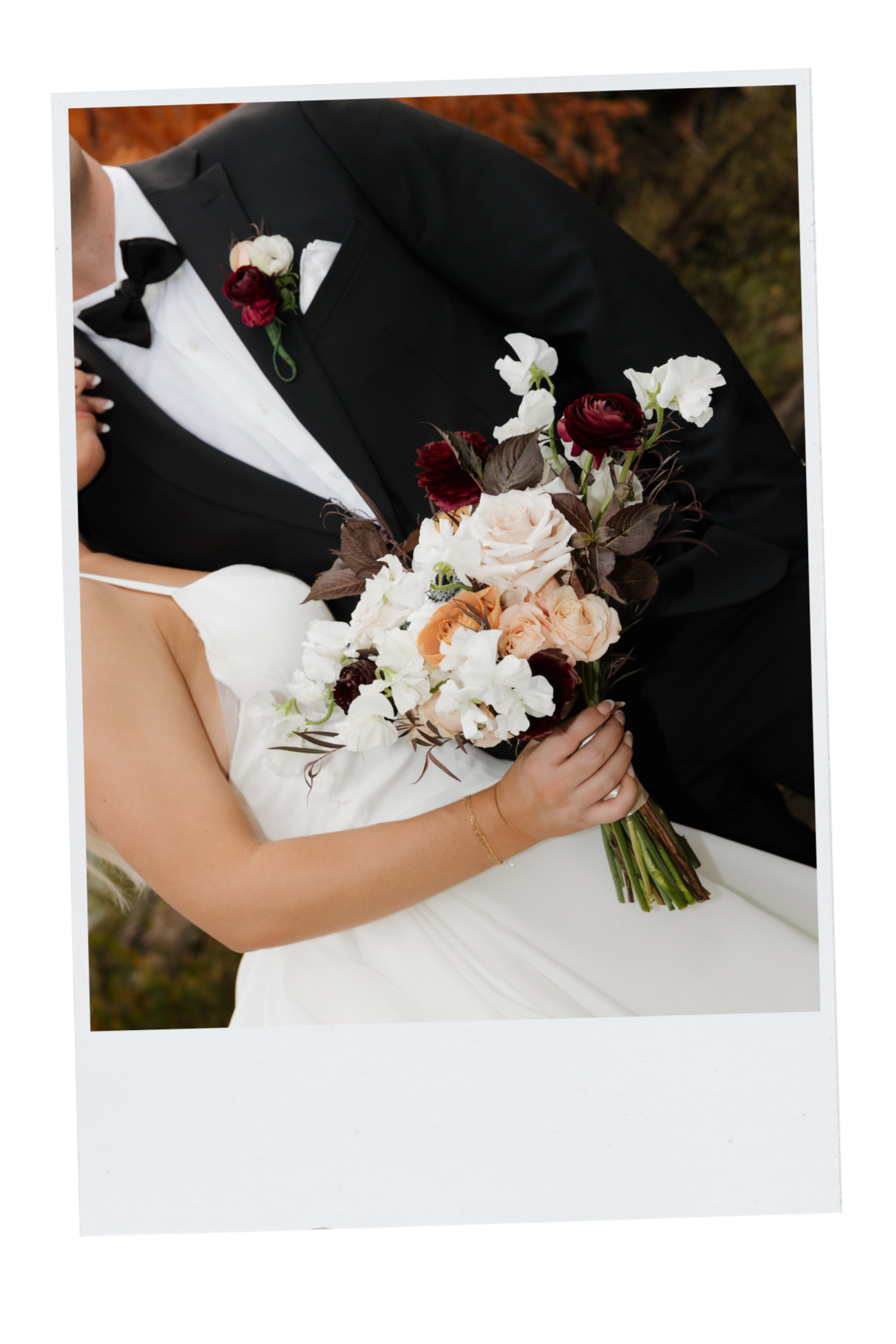 A bride and groom dressed in wedding attire, with the bride holding a bouquet of flowers.DC Wedding Photographer