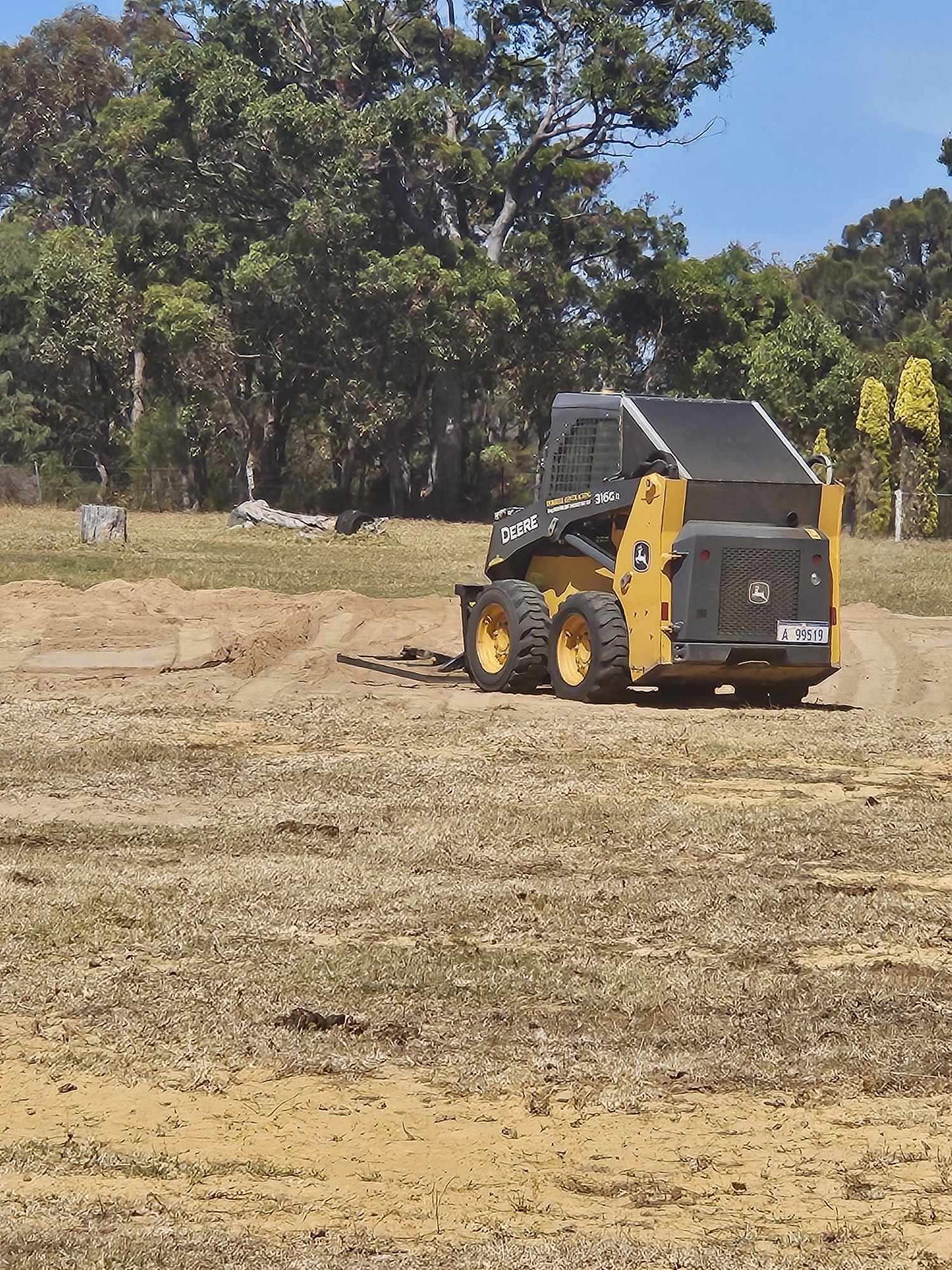 Leveling supplied sand in equestrian arena