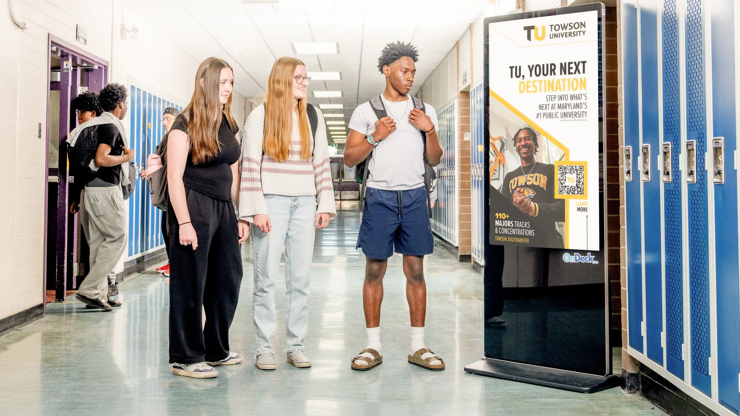 OnDeck screen in high school hallway