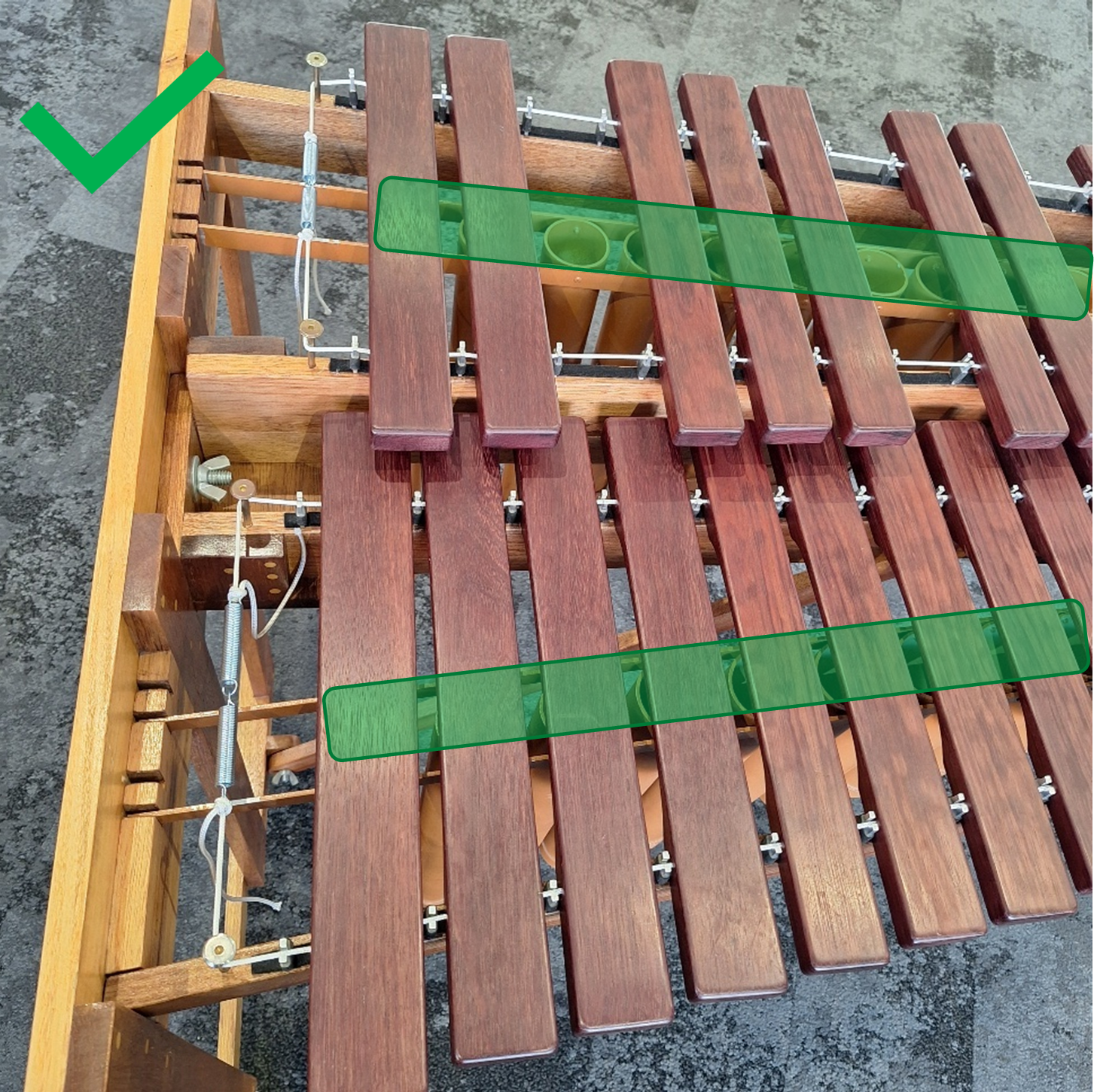 Overhead shot of marimba bars. Green highlight show the best playing zone.