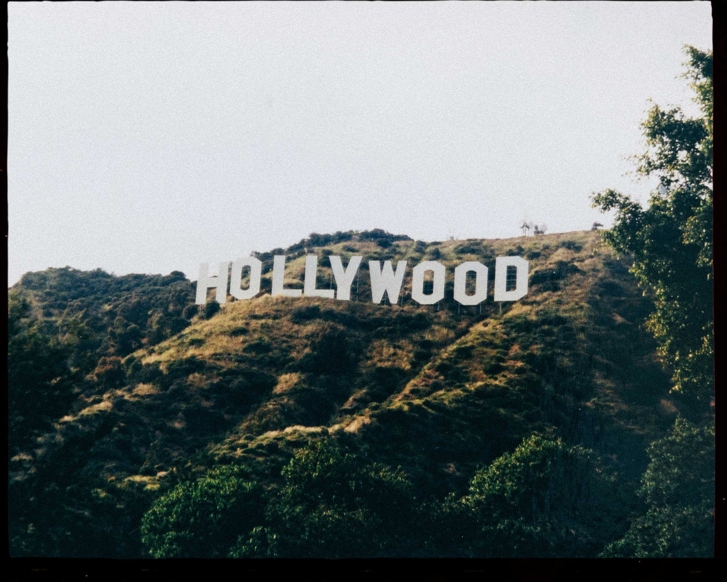 Editorial film photograph of the Hollywood sign in Los Angeles, analogue travel work by Karl Mackie