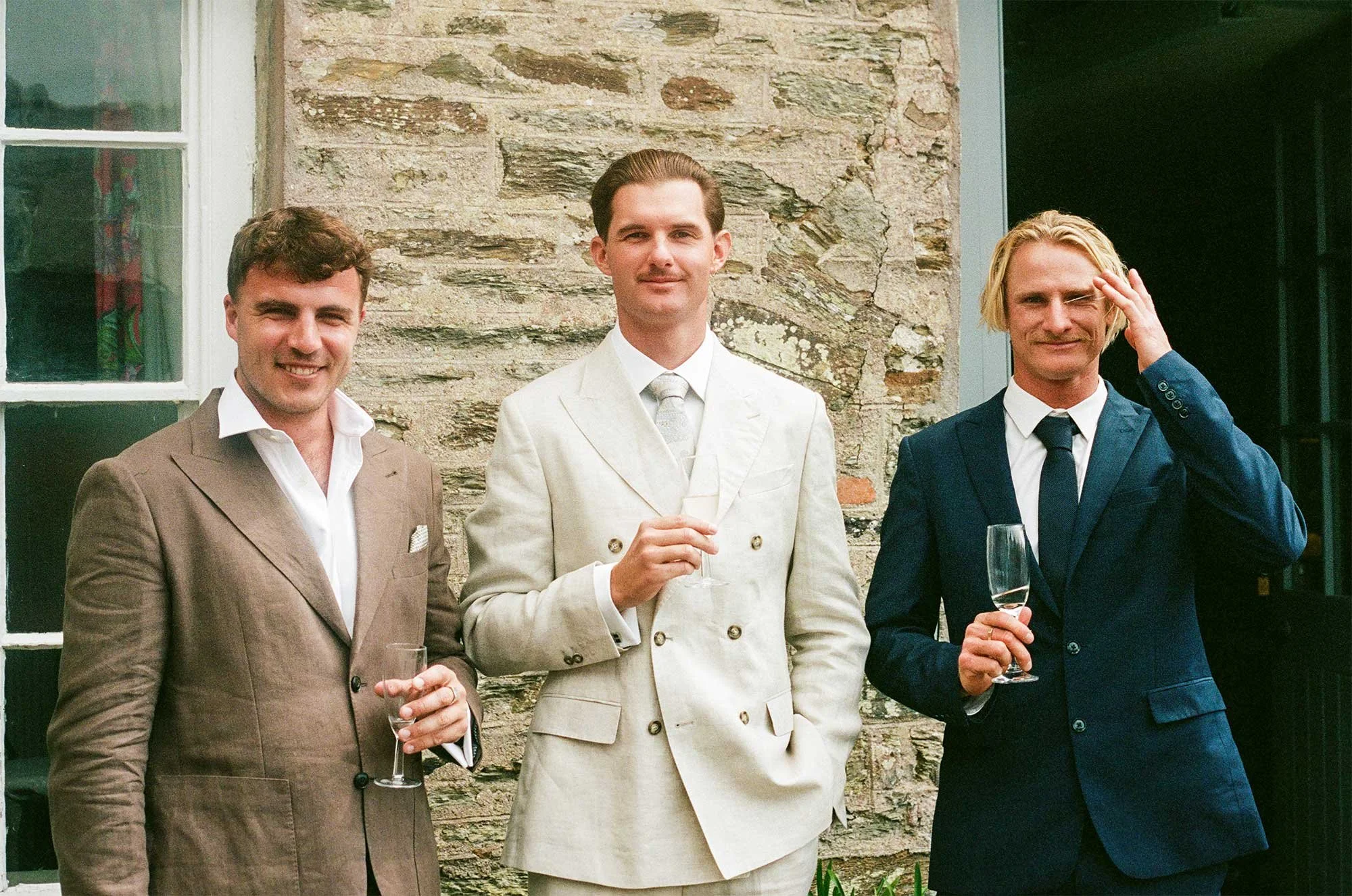 Groom with his best men photographed on 35mm film at a Cornwall wedding