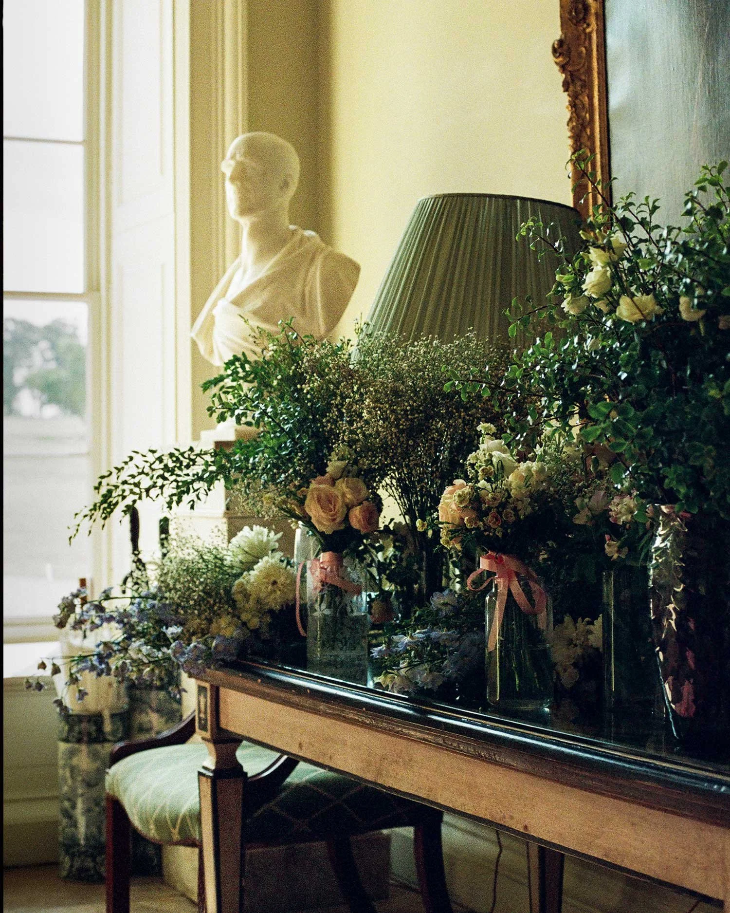 Wedding flowers arranged inside Boconnoc House photographed on 35mm film