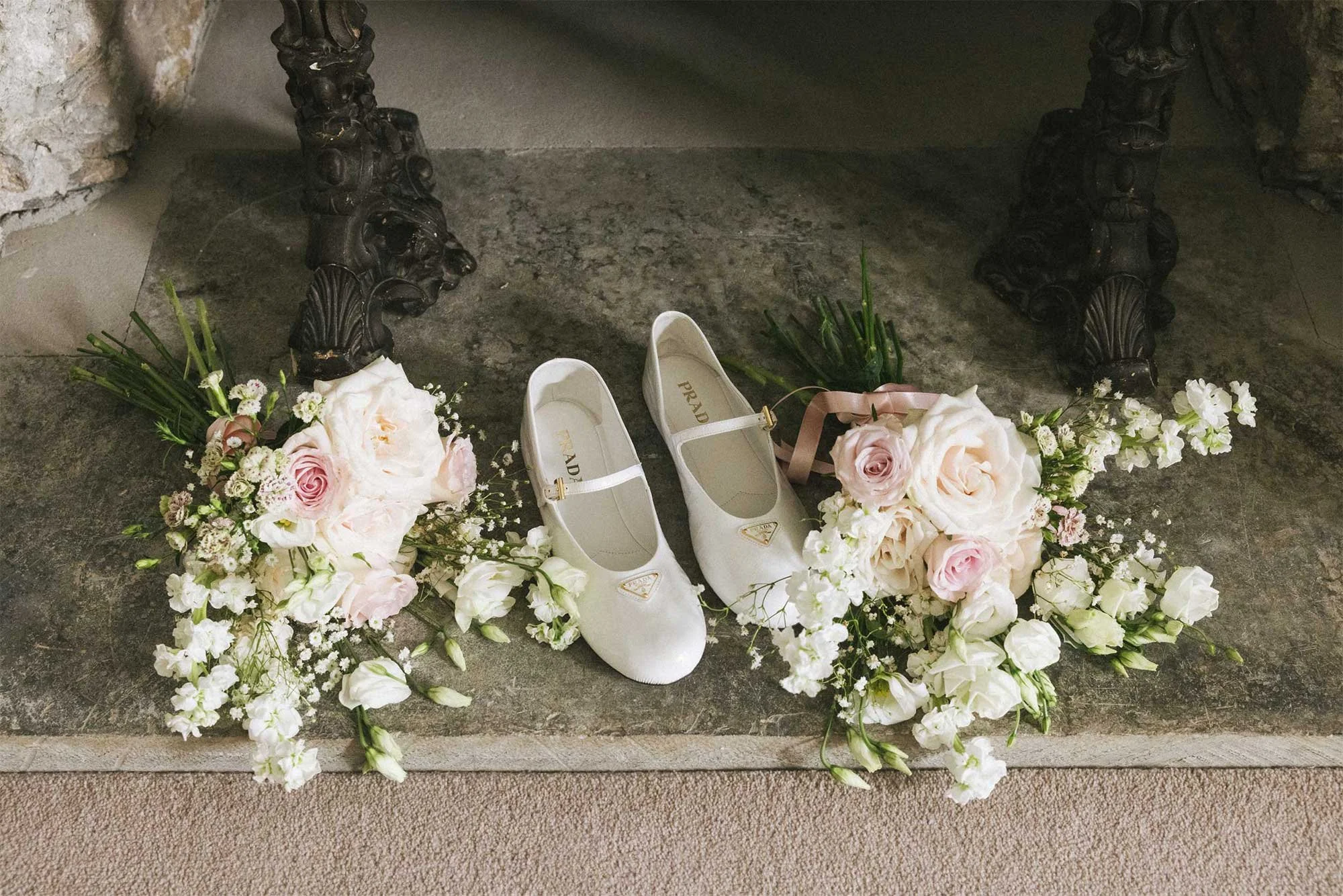 Prada bridal shoes and wedding flowers photographed on 35mm film in Cornwall