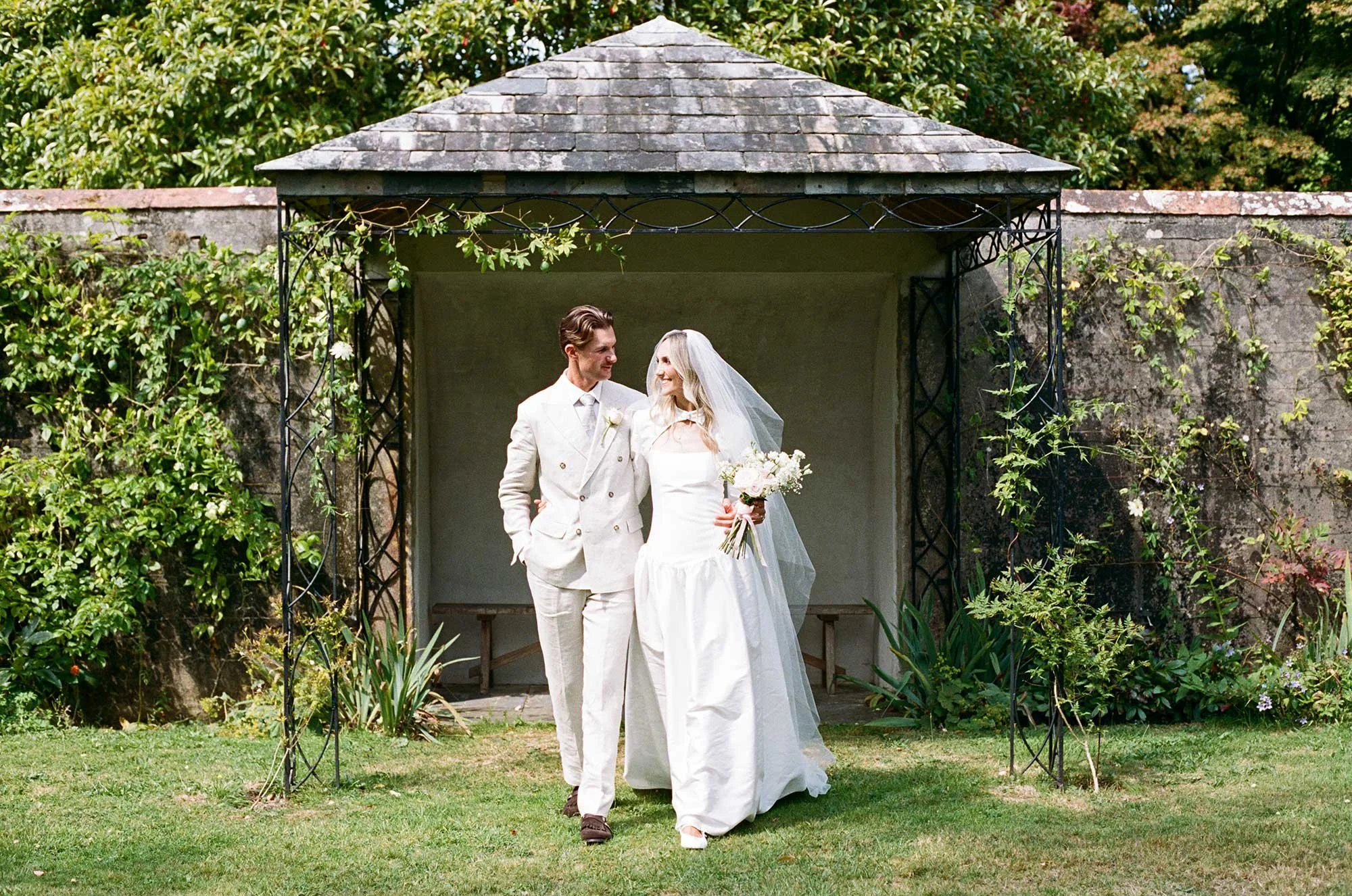 Bride and groom portrait photographed on 35mm film at a wedding in Cornwall