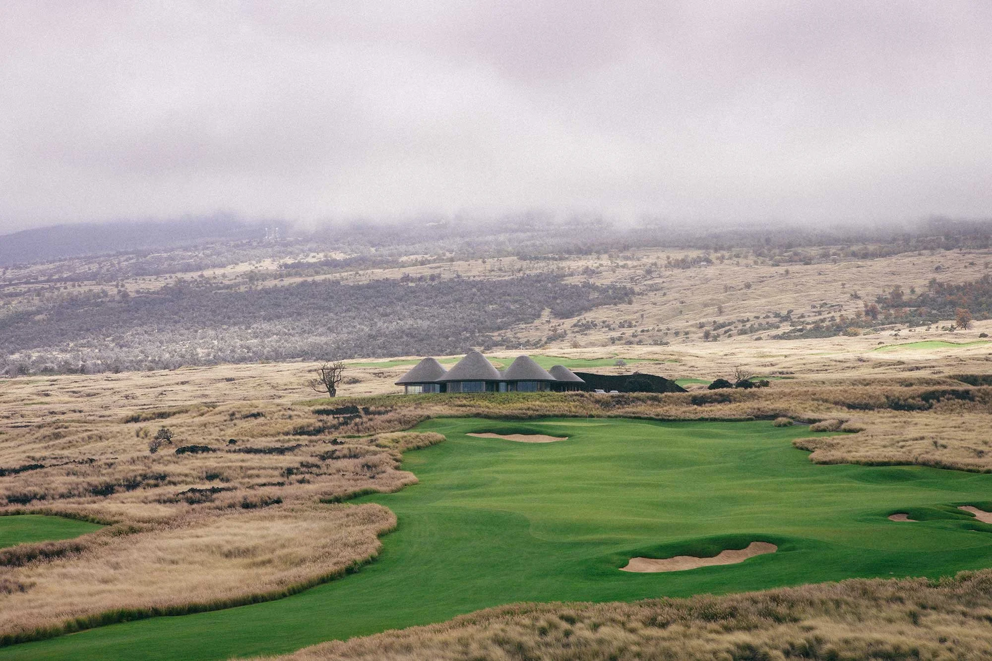 Nanea Golf Club fairway and bunkers set within the volcanic landscape of Hawaii
