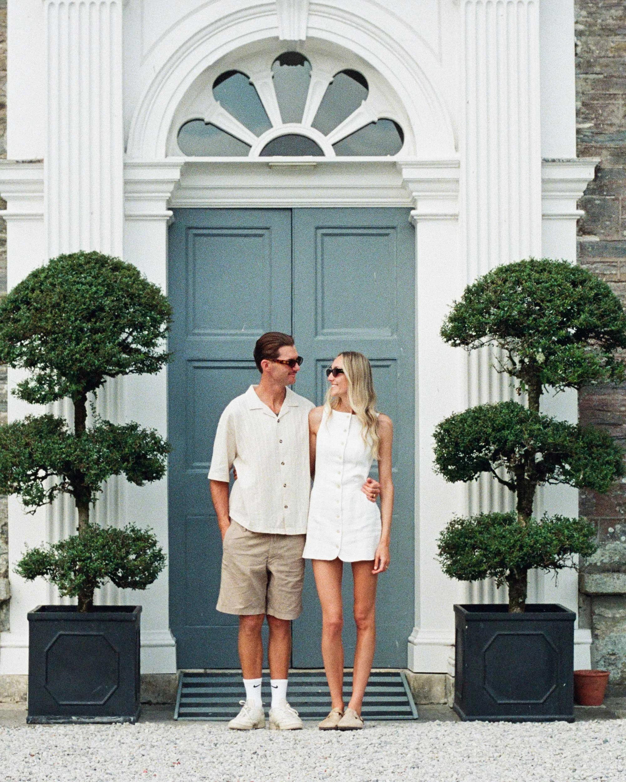 Editorial film wedding portrait of couple outside Boconnoc House and Estate in Cornwall, natural light documentary photography