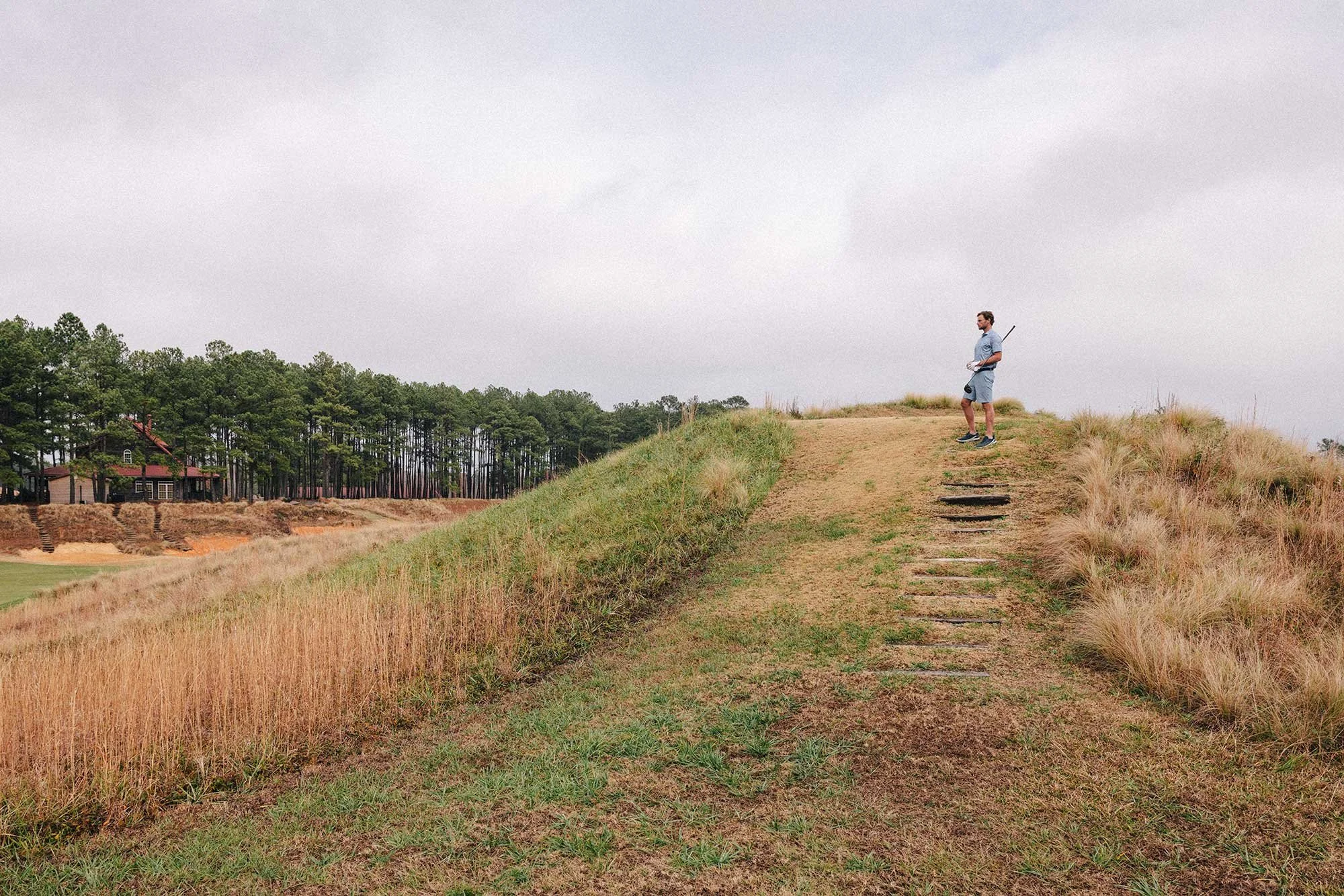 Golfer at the top of the hill at Tobacco Road Golf Course