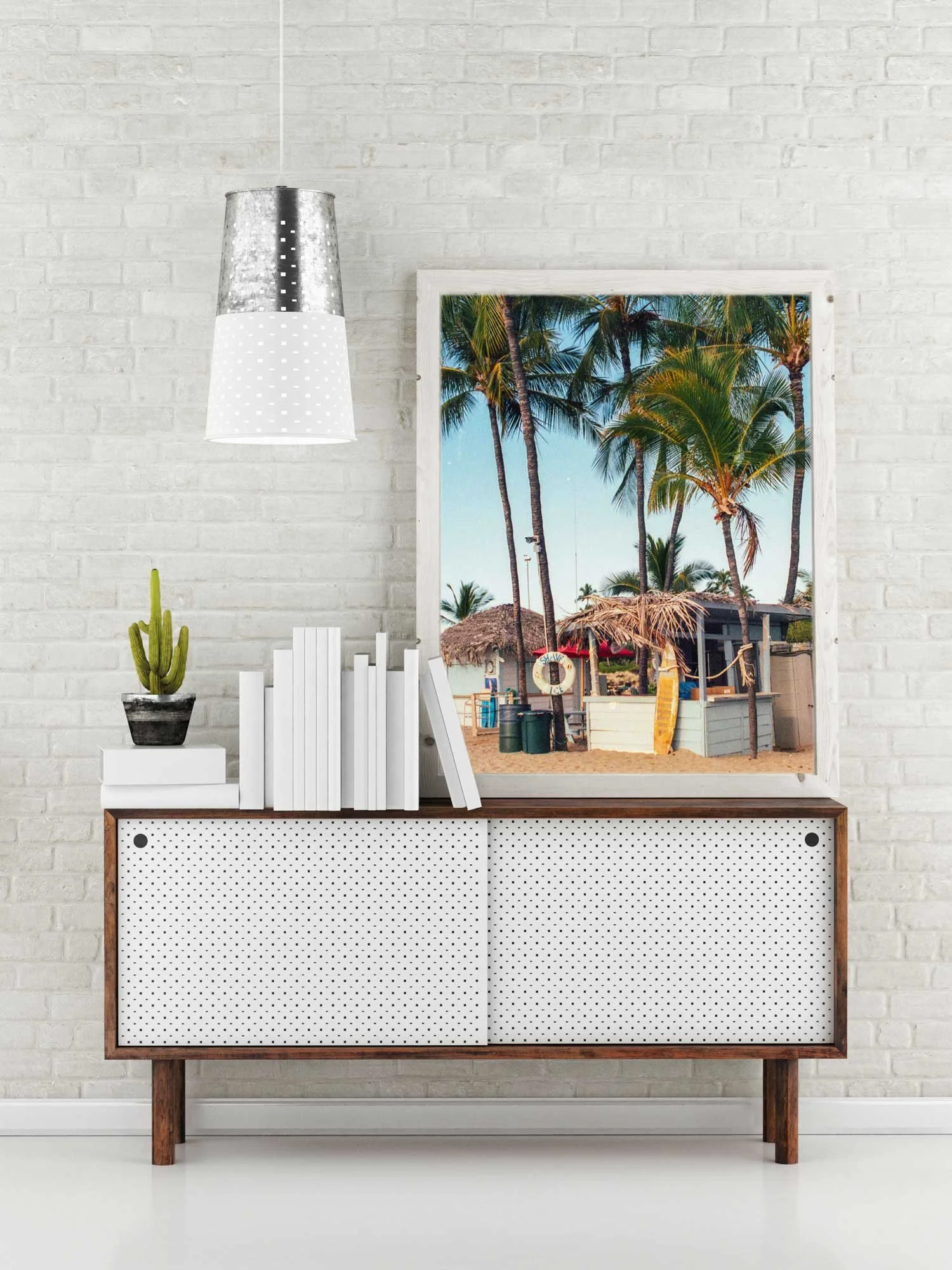 Framed Beach Bar fine art print by Karl Mackie displayed in a modern interior.