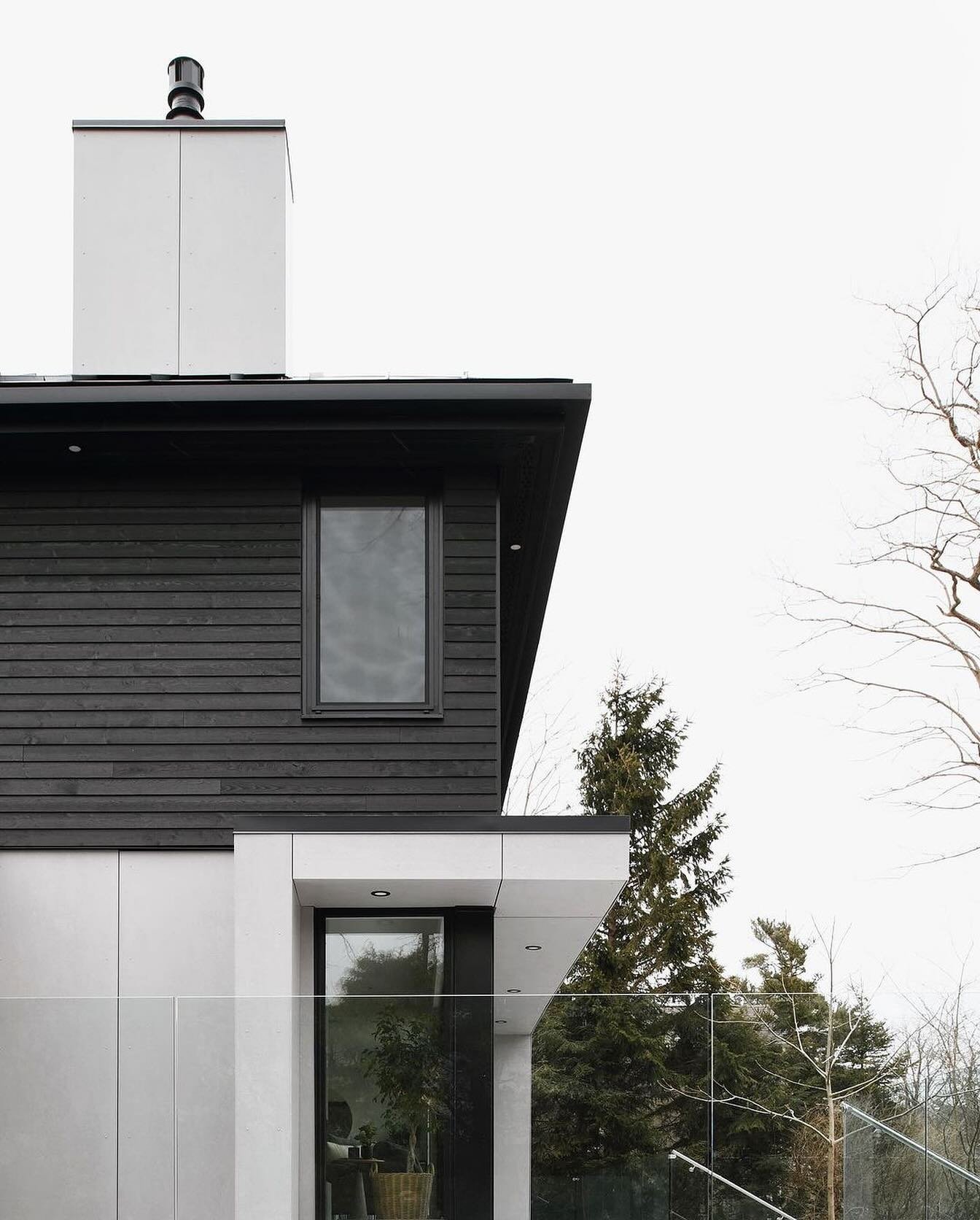 Repost from @starlingarchitects
&bull;
Shore Drive Residence

Concrete clad base punctured by a series of floor to ceiling glass lenses and anchored by a 3 sided fireplace 
.
.
.
.
#modernarchitecture #construction #contemporarydesign #homedesign #mo