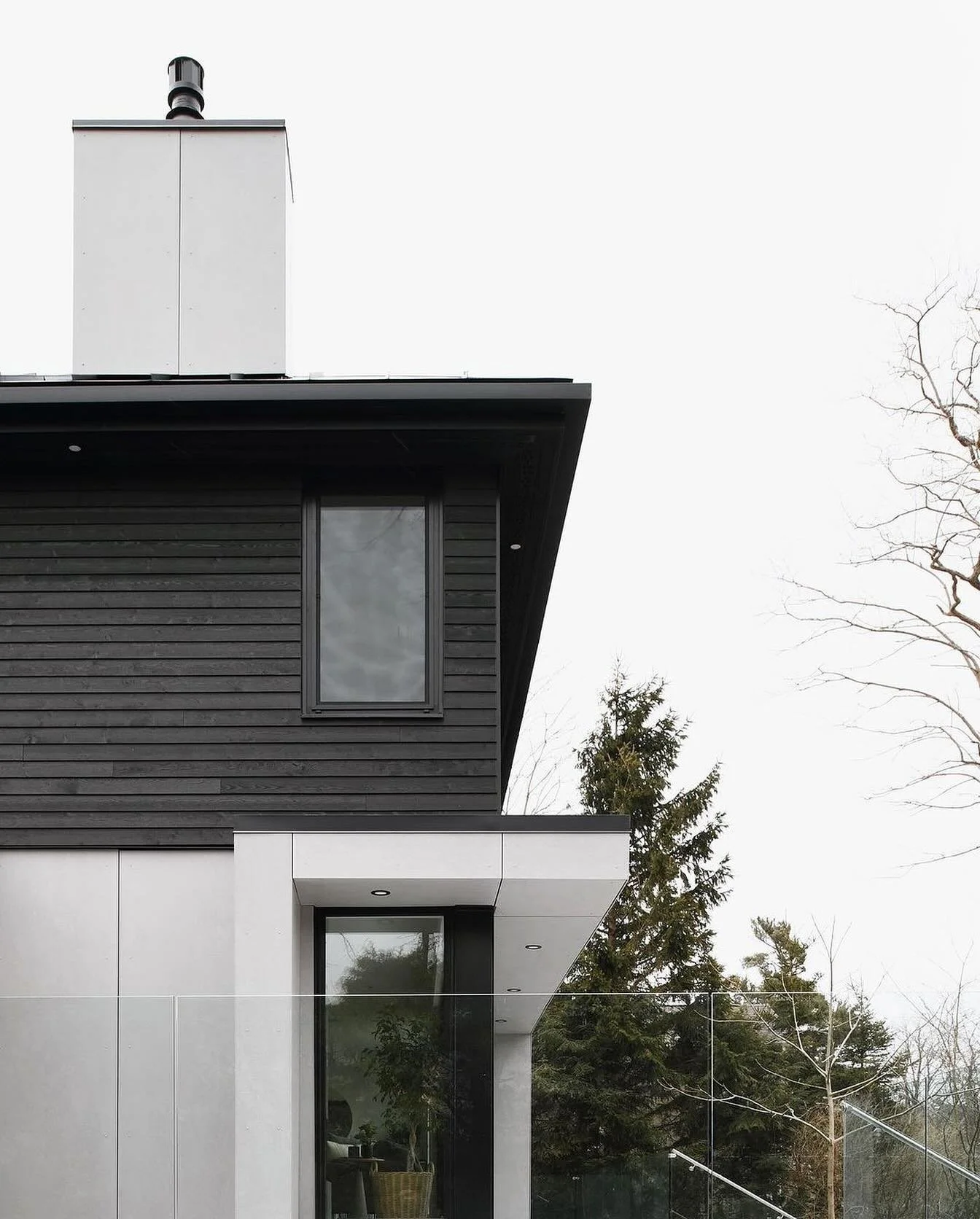 Repost from @starlingarchitects
&bull;
Shore Drive Residence

Concrete clad base punctured by a series of floor to ceiling glass lenses and anchored by a 3 sided fireplace 
.
.
.
.
#modernarchitecture #construction #contemporarydesign #homedesign #mo