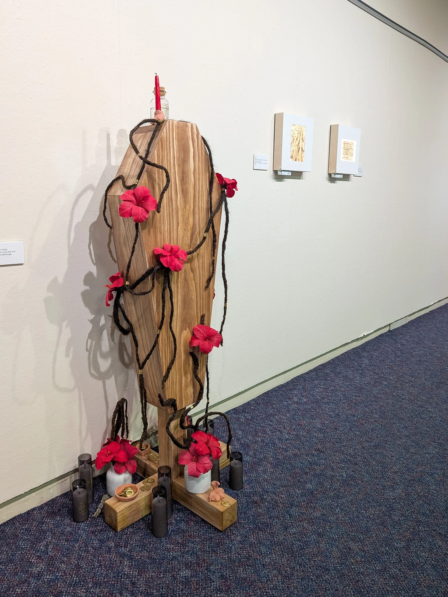 "Reclamation" (2026) installed at UMB Archive. Hair, clay, paper, and other media