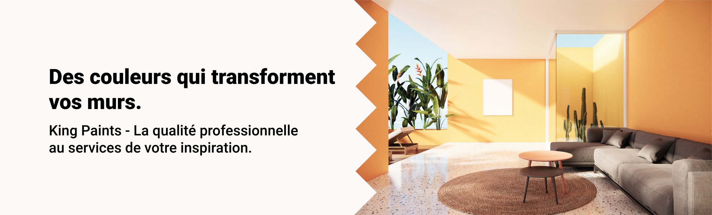 Une pièce lumineuse avec un mur orange, un canapé gris, une table ronde, et des plantes en pot, dont des cactus, près d'une fenêtre laissant entrer la lumière naturelle.