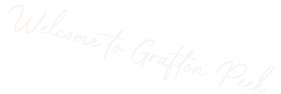 Decorative text reading "Welcome to Grafton Peak" in white cursive on a black background.