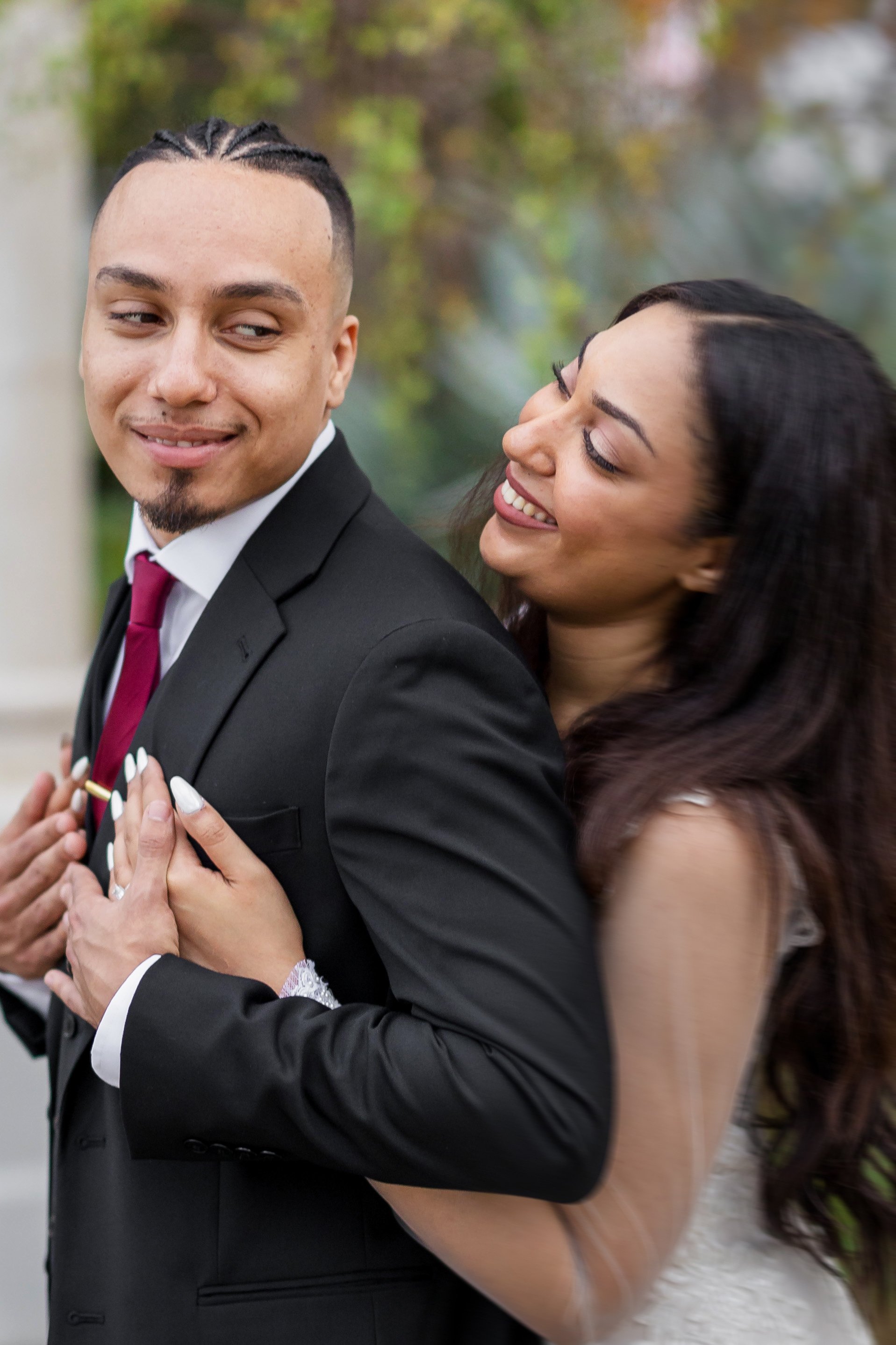 Creative fx studios | wedding photography | Bride hugging groom