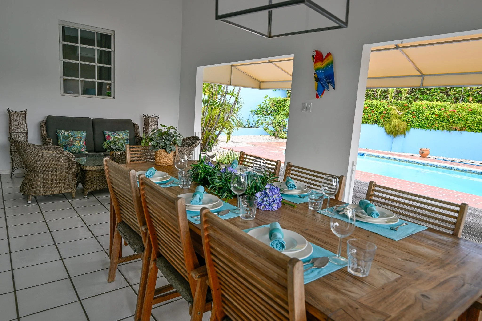 Large porch with extra seating and dining room table