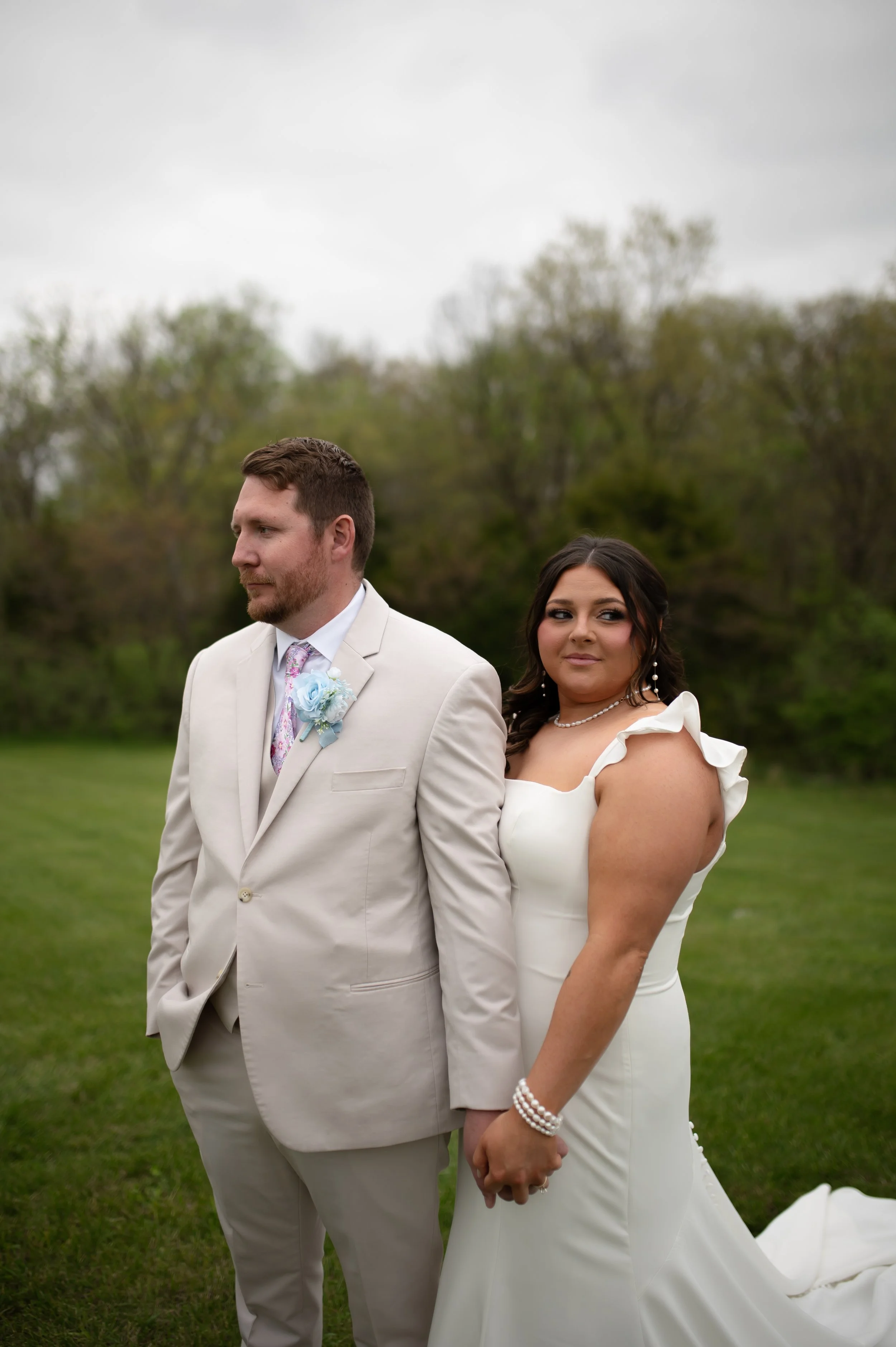 Bride and groom posing on their wedding day
