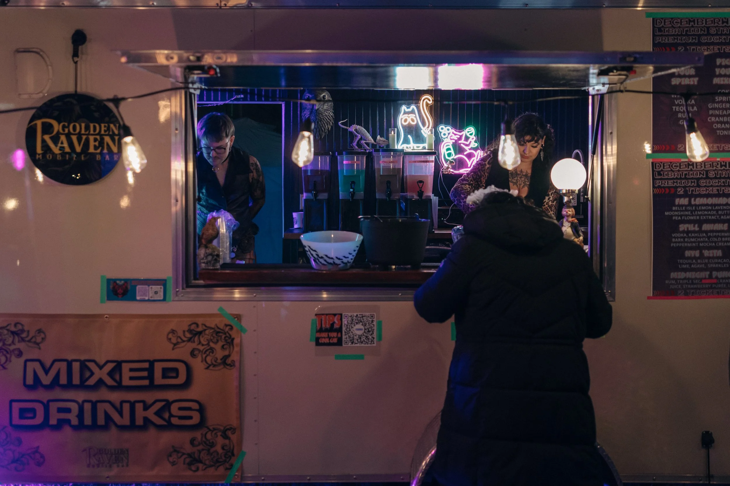 Kitty cat neon lights are our favorite addition to Golden Raven.