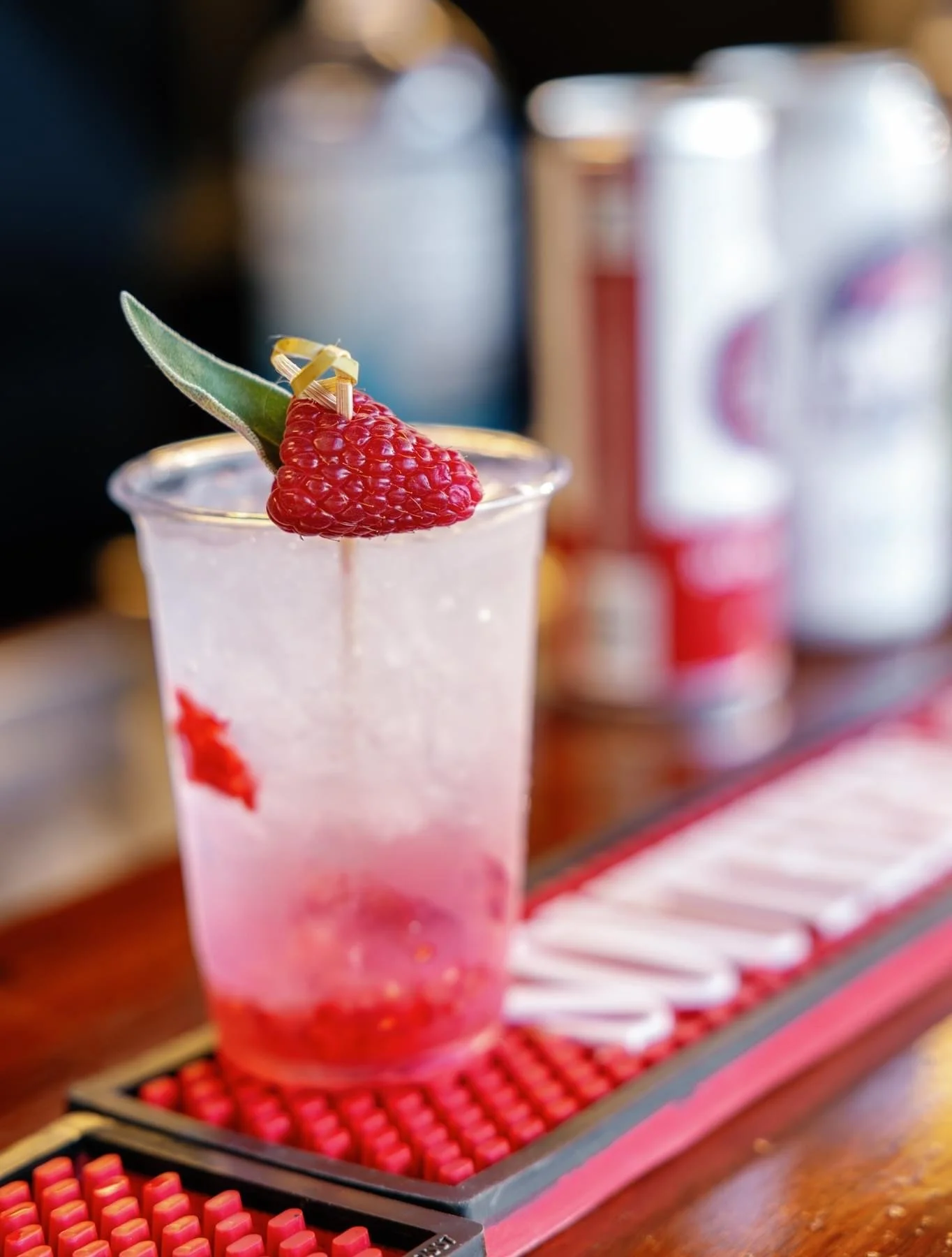 Photo of a fresh raspberry sage cocktail. Photograph by Alex Oswald photography