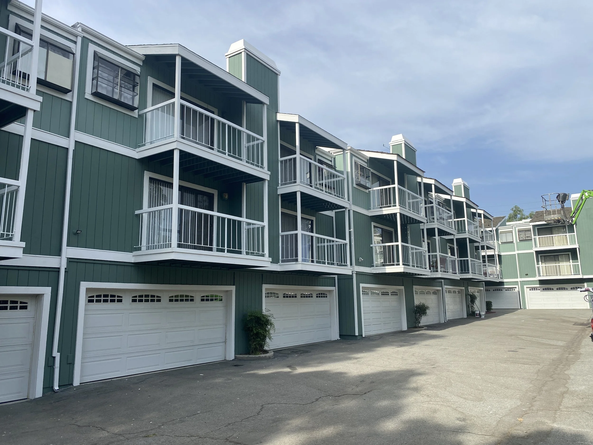 wood siding replaced and repainted apartment building