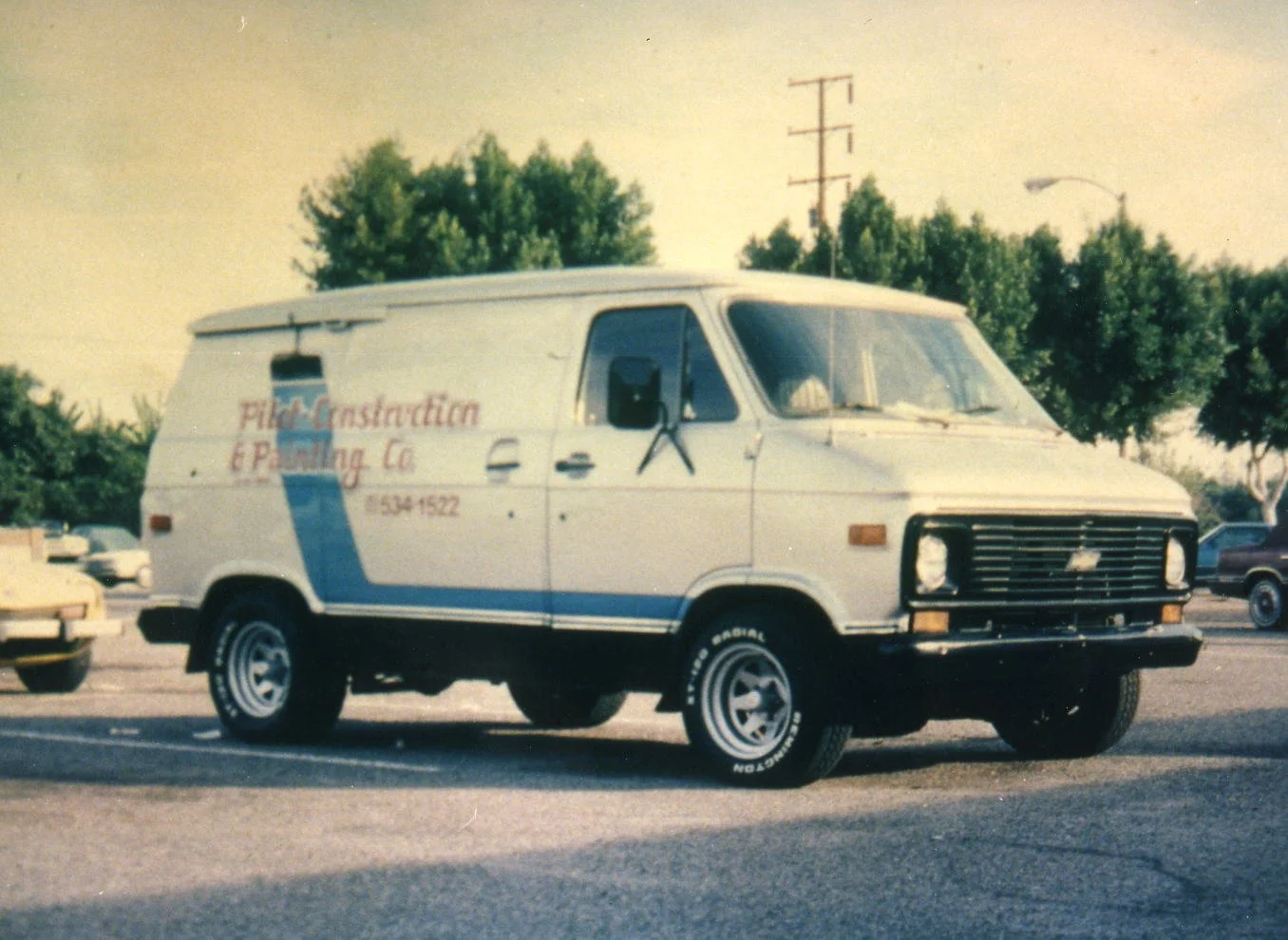 Pilot Painting van highlighting over 50 years of experience in commercial and multi-family exterior painting.