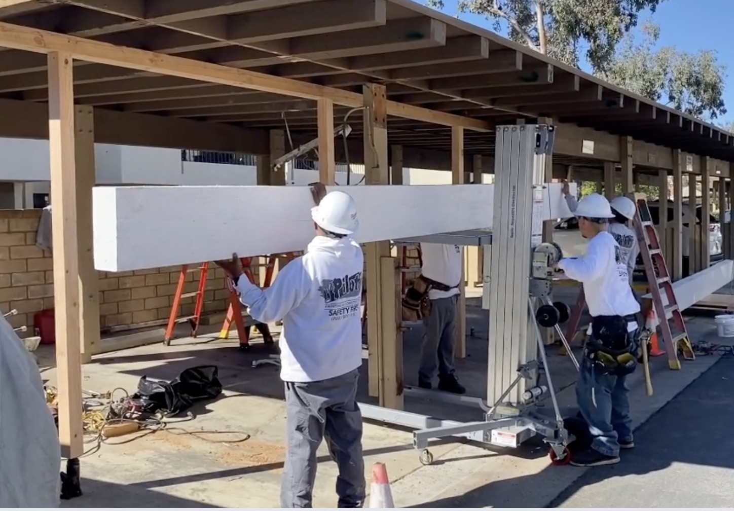 Pilot repairing wood for an HOA Community