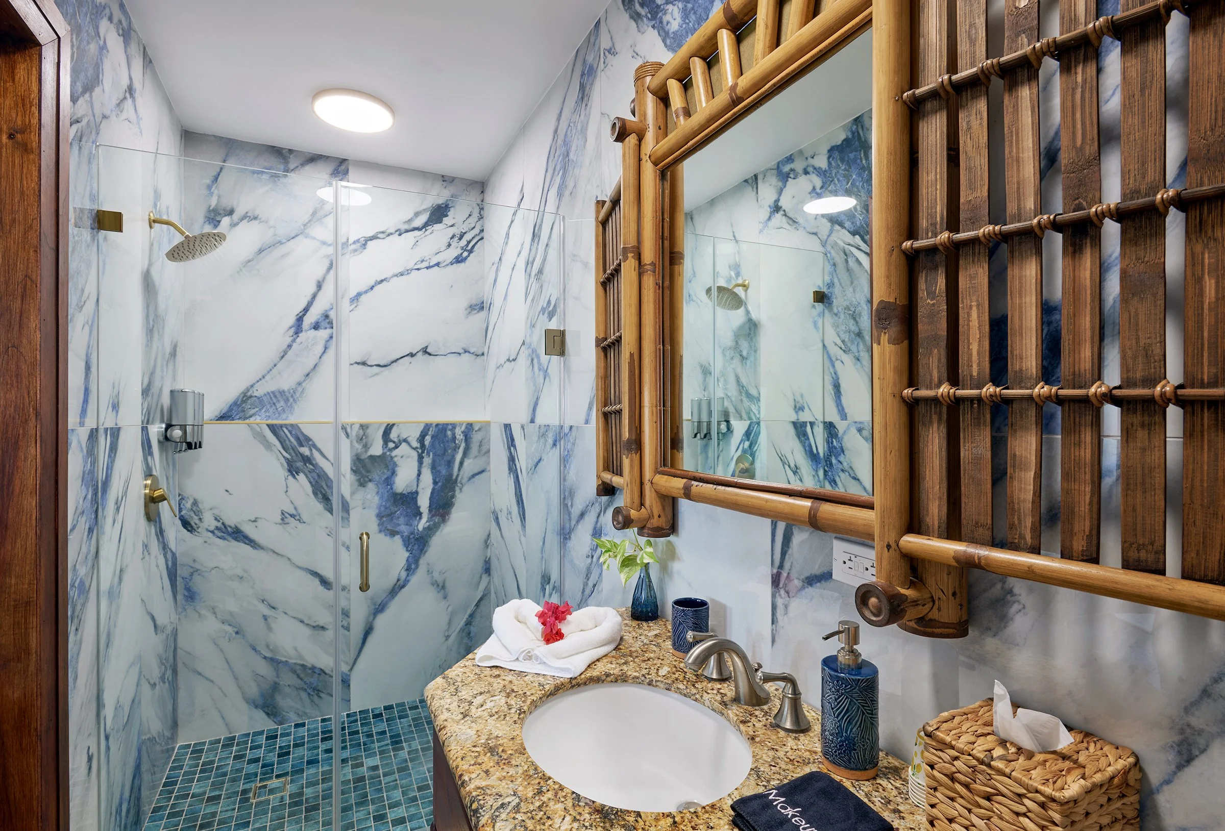 Bamboo Cottage-- Poolside Seagrape Suite 
This suite on the lower level of the cottage has a king bed with a walk in shower. Steps away from the pool and deck. Internal privacy door can be unlocked to access adjoining the Palm Suite.