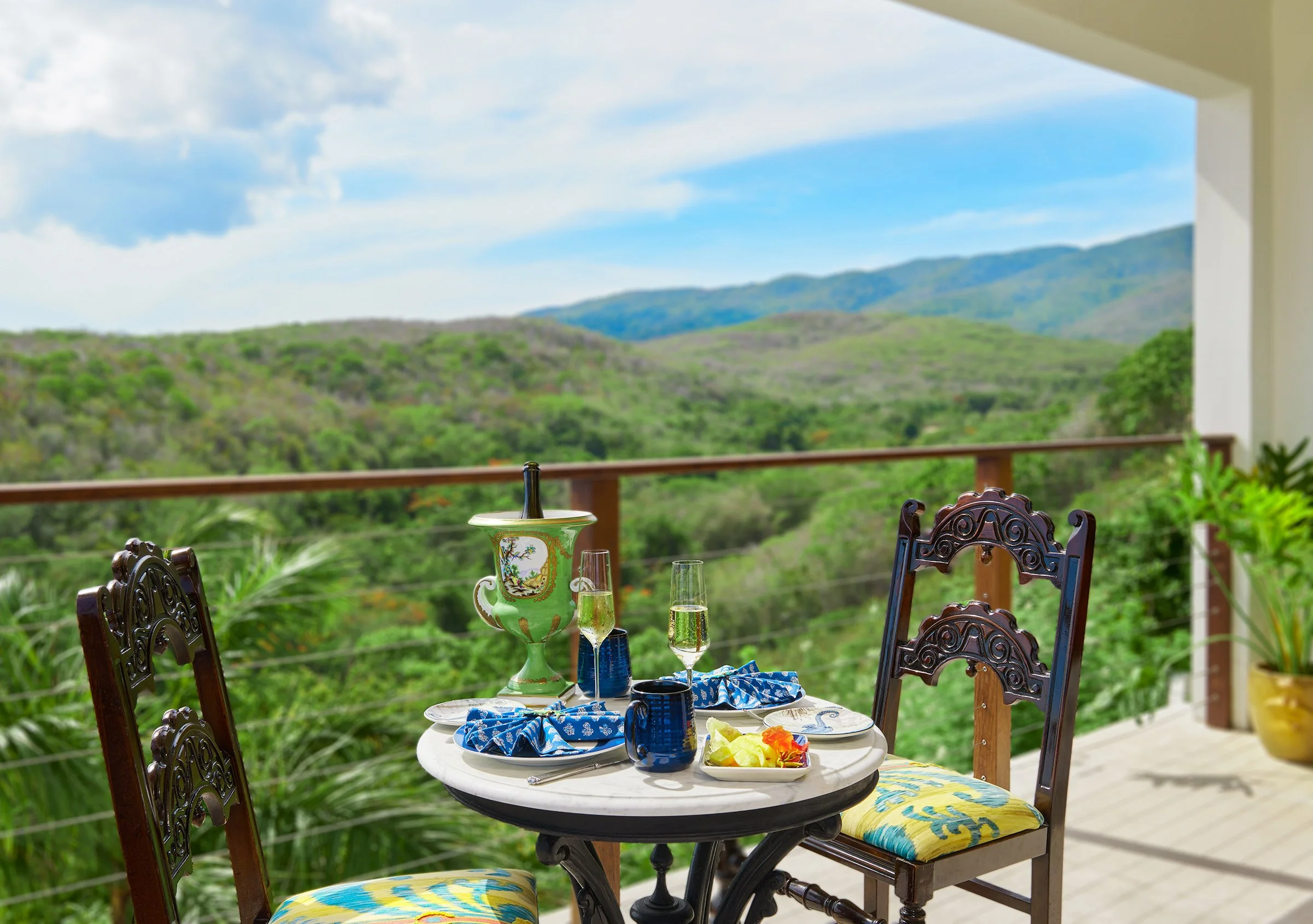 Private Patio outside of the amazing Bromeliad Suite overlooking the Mount Zion valley- just beside the vast Caribbean Sea views of the larger accompanying deck. 