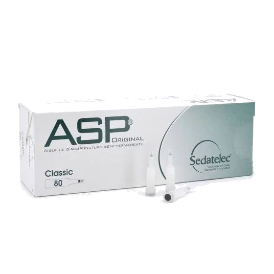 Box of ASP acupuncture needles with two needles in front.