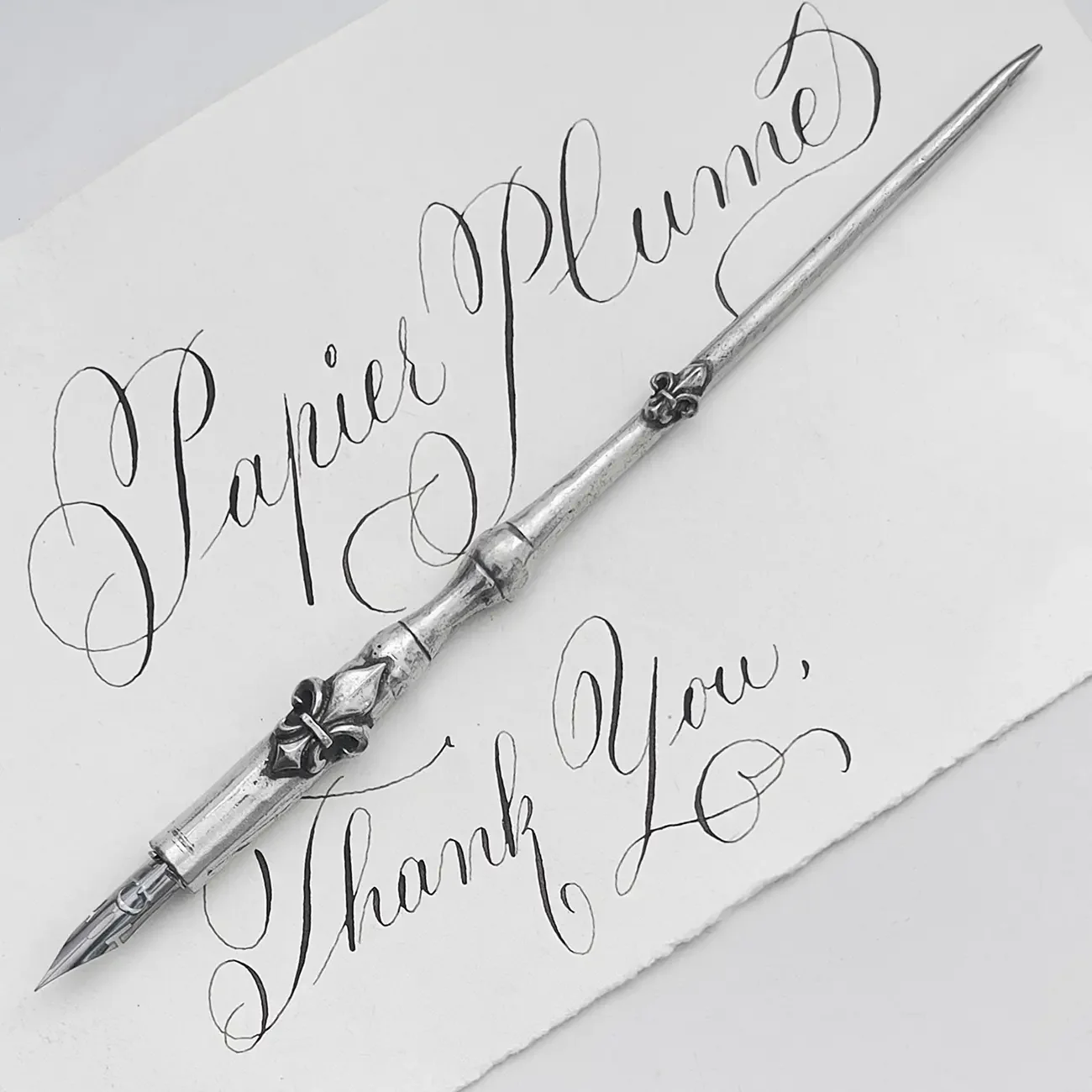 Fleur de Lys silver pen.webp