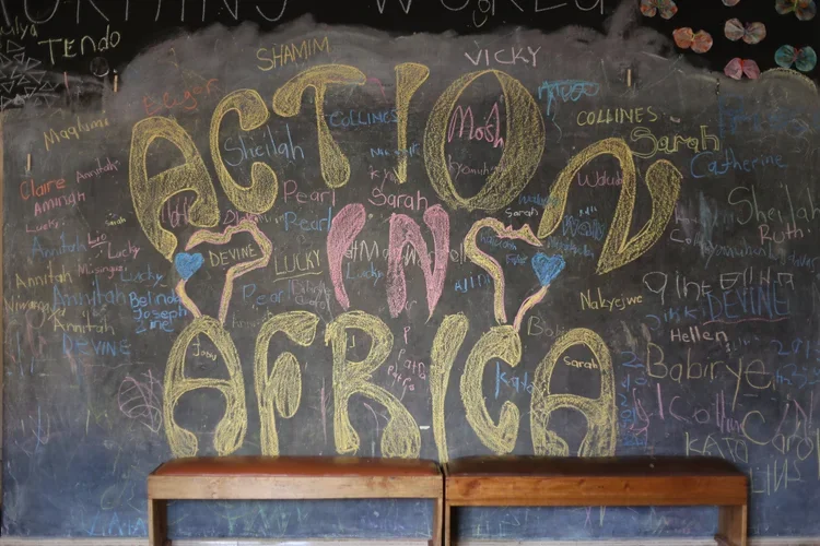 Chalkboard with Action in Africa written boldly
