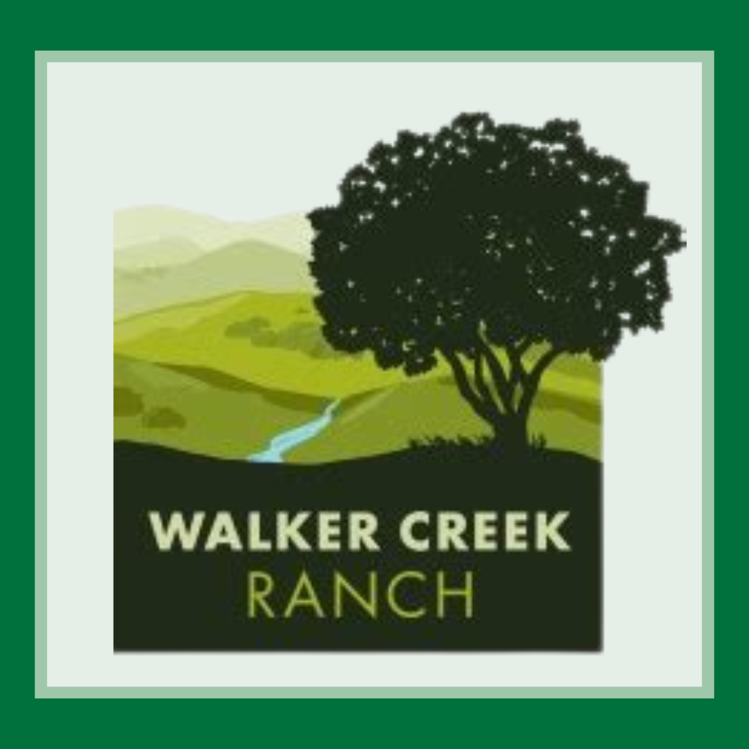 Walker Creek Ranch logo. It features a tree overlooking a green valley with a river running through it.