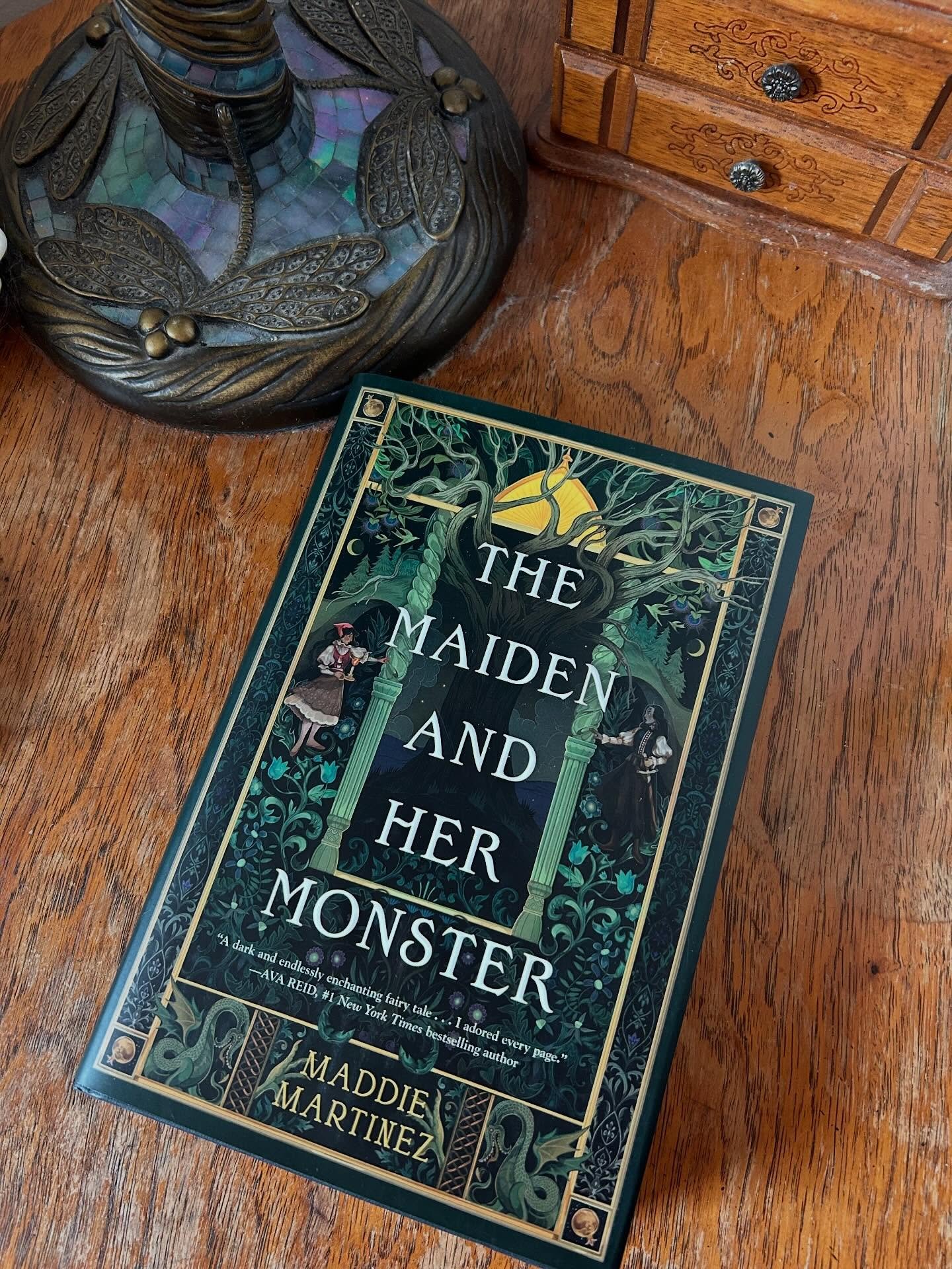 Our March Book Pick is THE MAIDEN AND HER MONSTER by @maddiesmartinez! 

I was immediately enraptured by this pitch, and I cannot wait to dive into the book this month. 
🌲
The forest eats the girls who wander out after dark.

As the healer&rsquo;s d