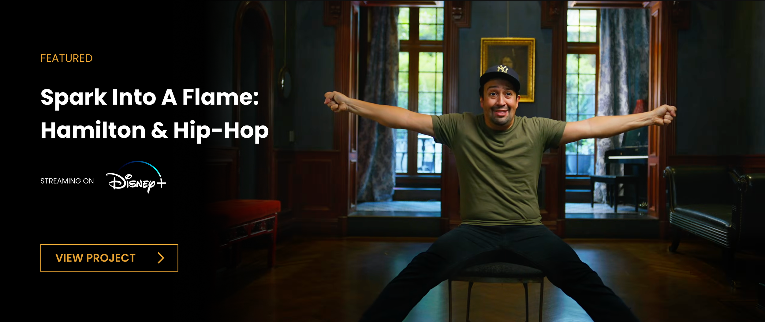 Lin Manuel-Miranda in a Yankees baseball cap. texts saying "Spark Into A Flame: Hamilton & Hip-Hop" and "Streaming on Disney+"