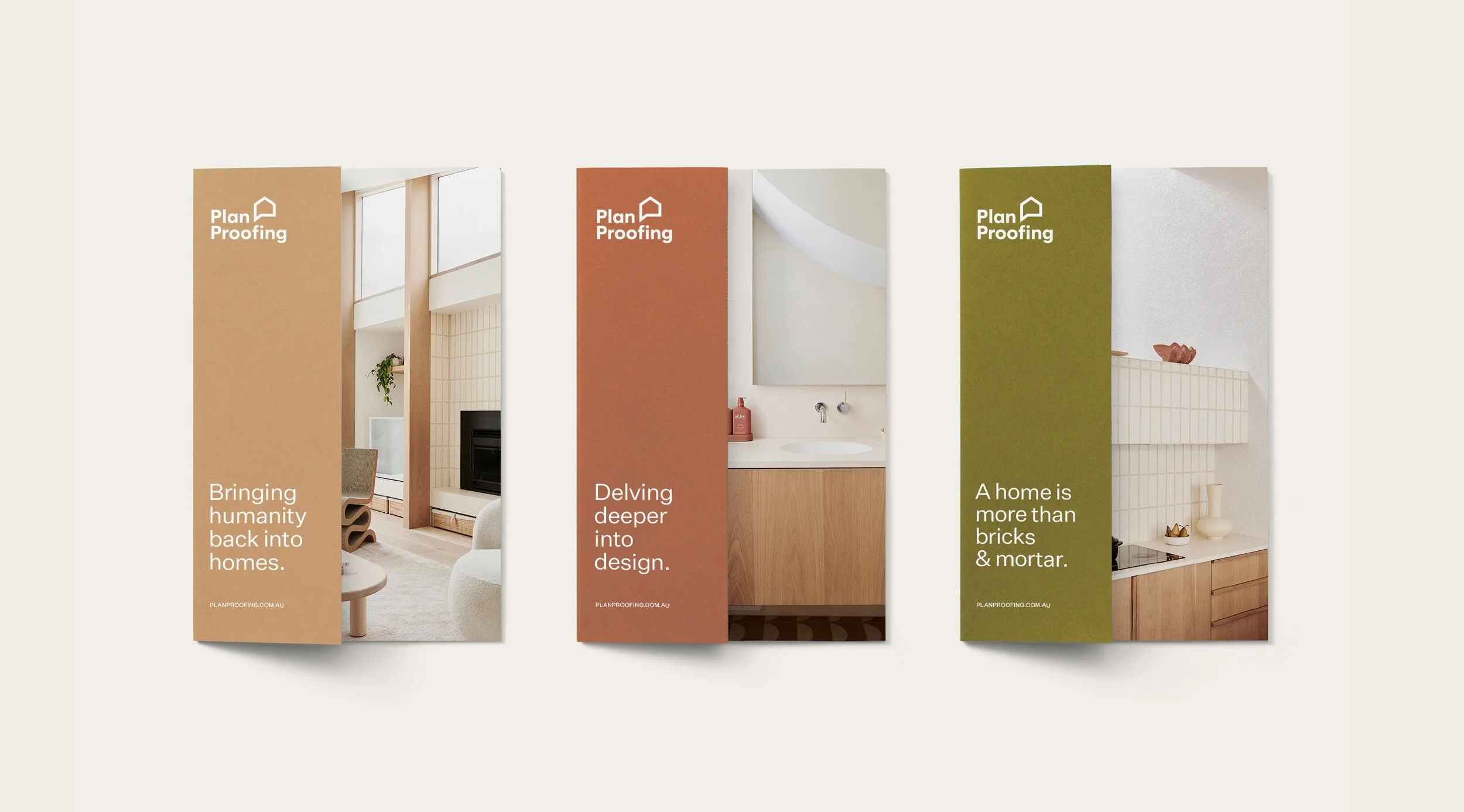 Three printed promotional brochures for Plan Proofing, each featuring a different interior home design with a colored vertical band on the left side. The first brochure shows a cozy living room with a fireplace, beige tiles, and a white armchair. The second features a bathroom with a wooden vanity, white sink, and mirror. The third displays a kitchen with wooden cabinets, a tiled backsplash, and decorative items. Each brochure has a brief slogan and the website URL at the bottom.