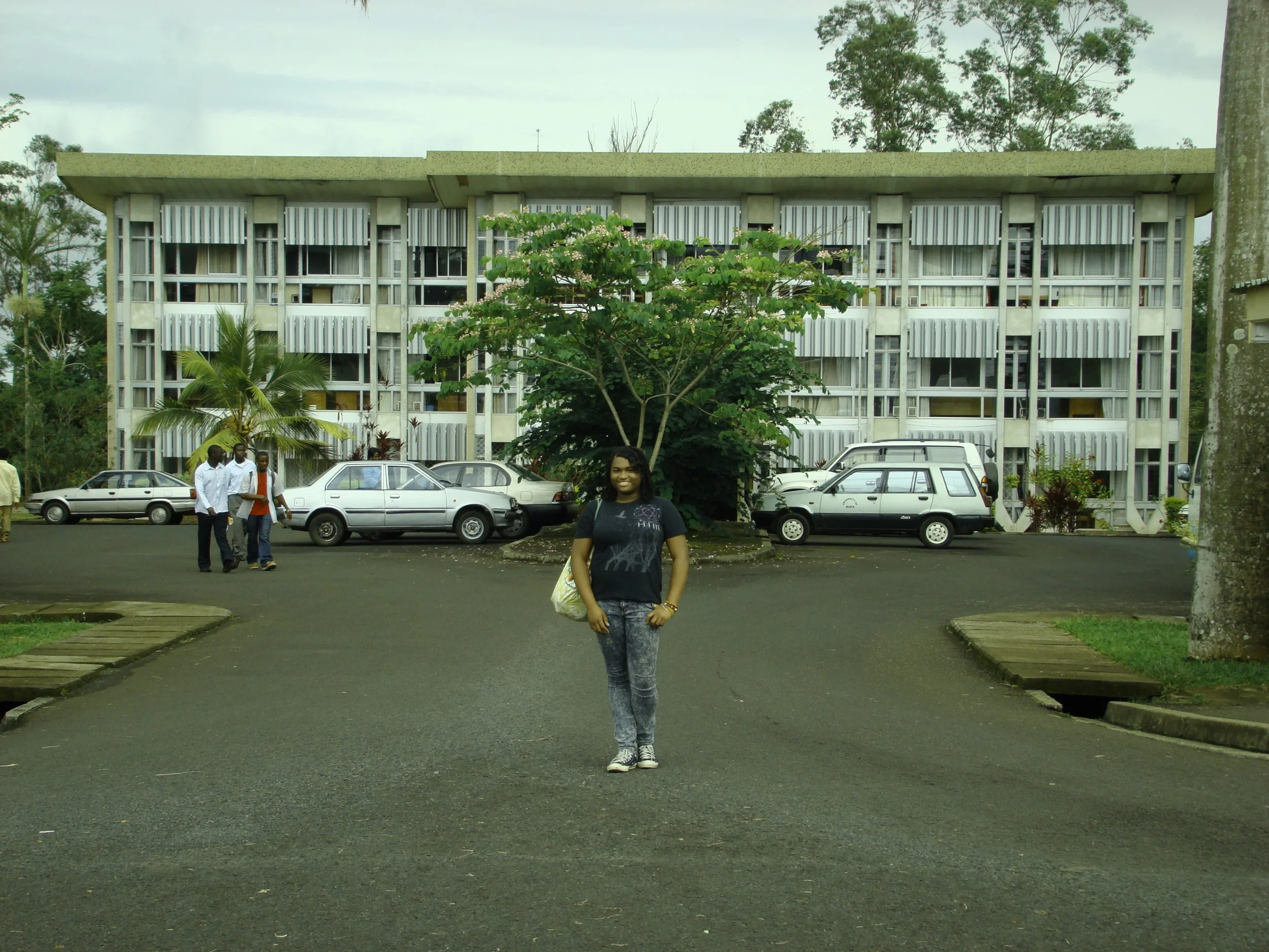 Daisy in front of the University of Buea on of her first trips back home (Buea, Cameroon, 2009)