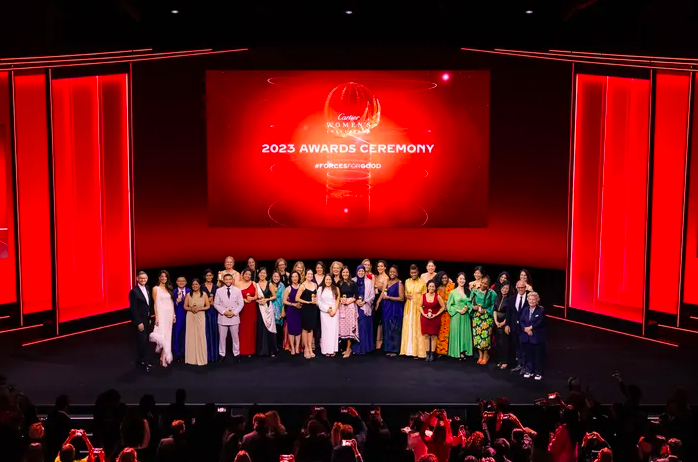 Denica Riadini-Flesch and other female founders standing on stage at the 2023 Cartier Awards Ceremony.